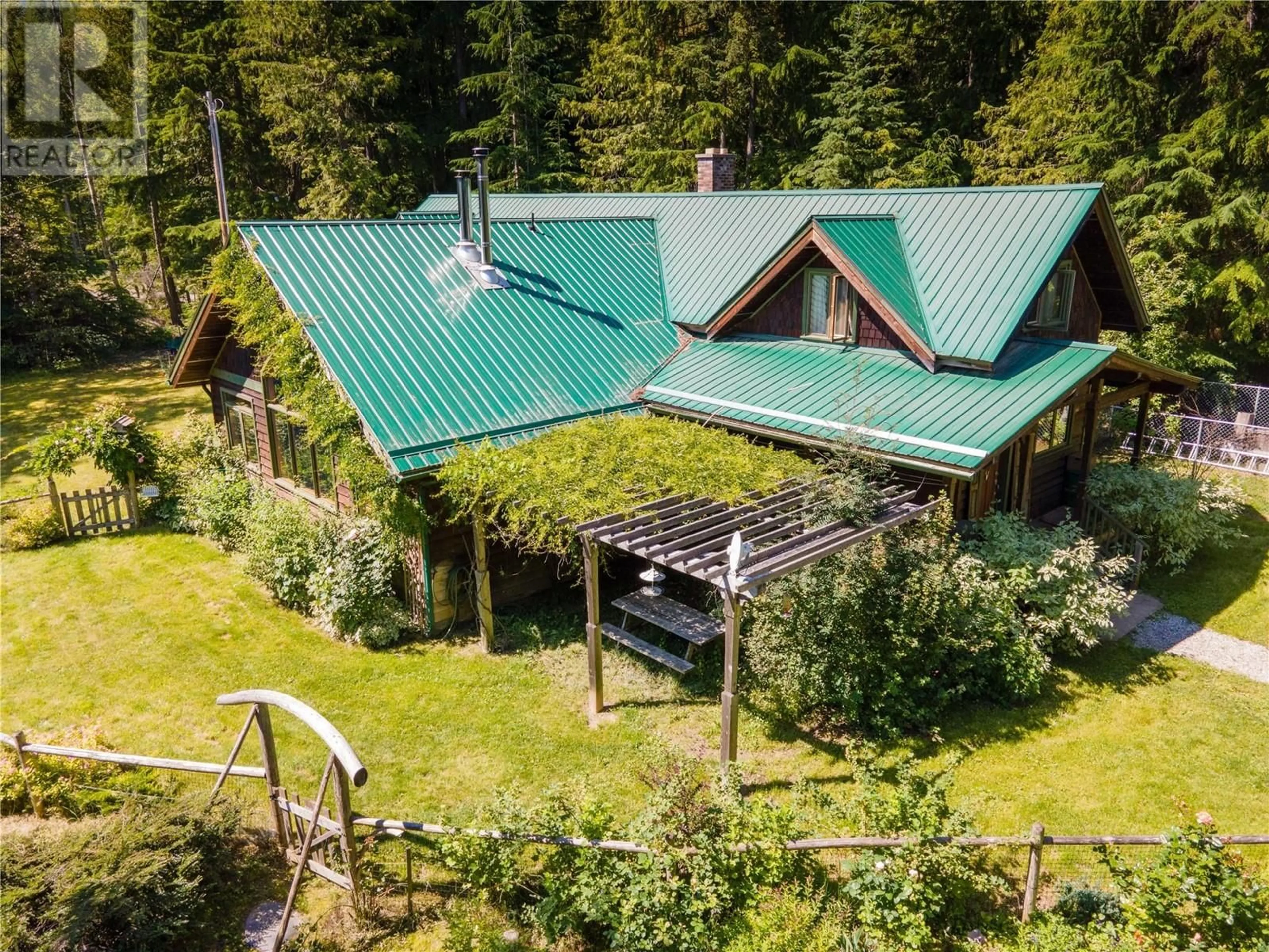 A pic from outside/outdoor area/front of a property/back of a property/a pic from drone, unknown for 9323 Shutty Bench Road, Kaslo British Columbia V0G1M0