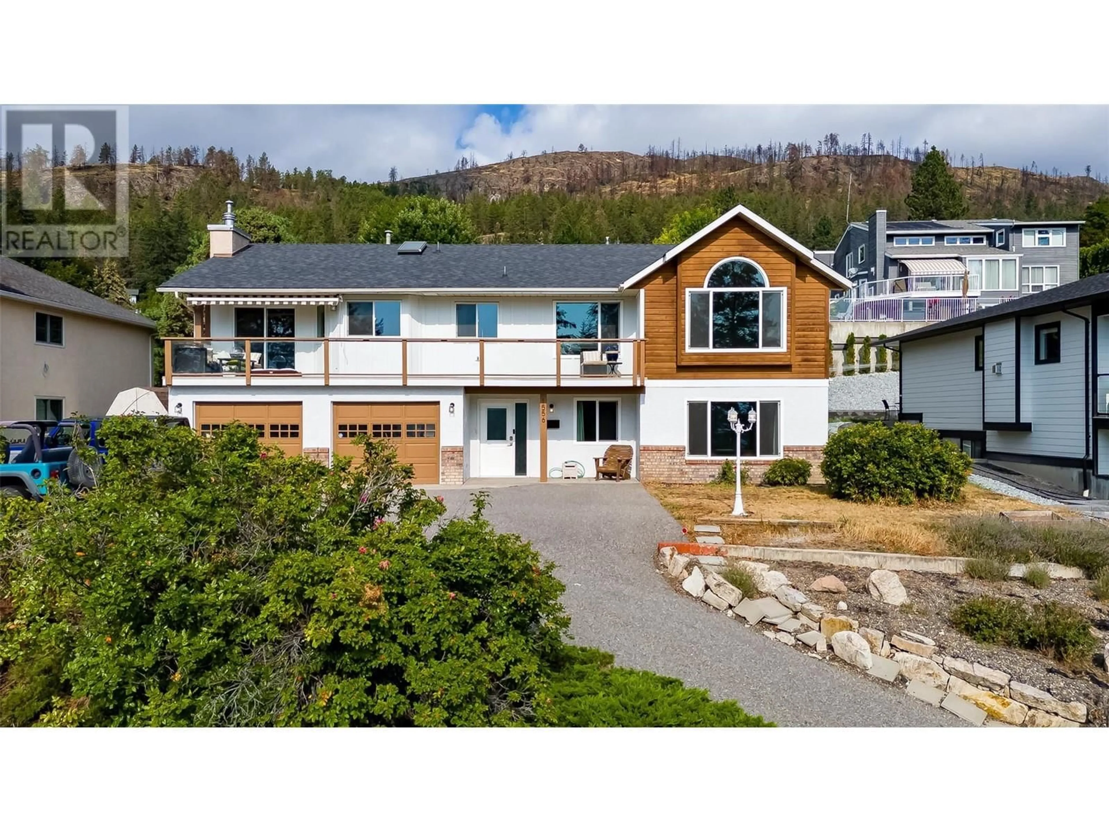 A pic from outside/outdoor area/front of a property/back of a property/a pic from drone, unknown for 1556 Blackwood Drive, Kelowna British Columbia V1Z3B7