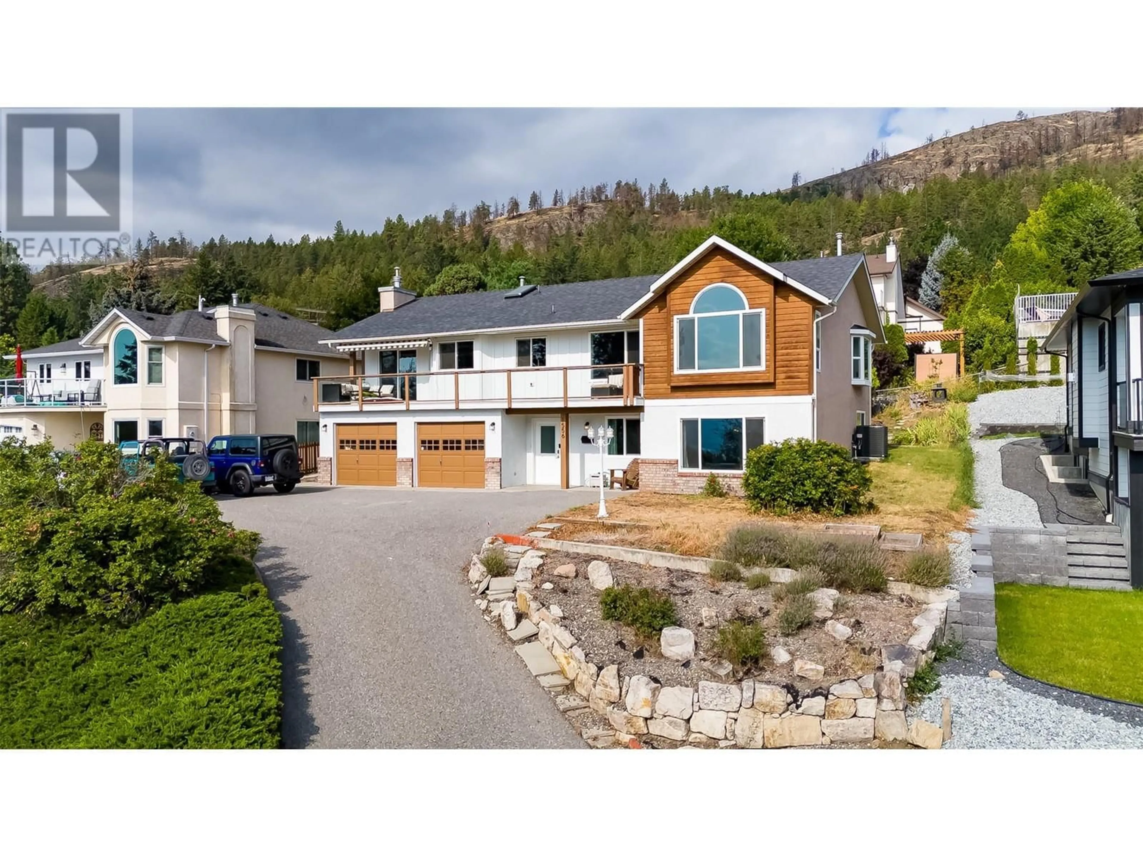 A pic from outside/outdoor area/front of a property/back of a property/a pic from drone, unknown for 1556 Blackwood Drive, Kelowna British Columbia V1Z3B7