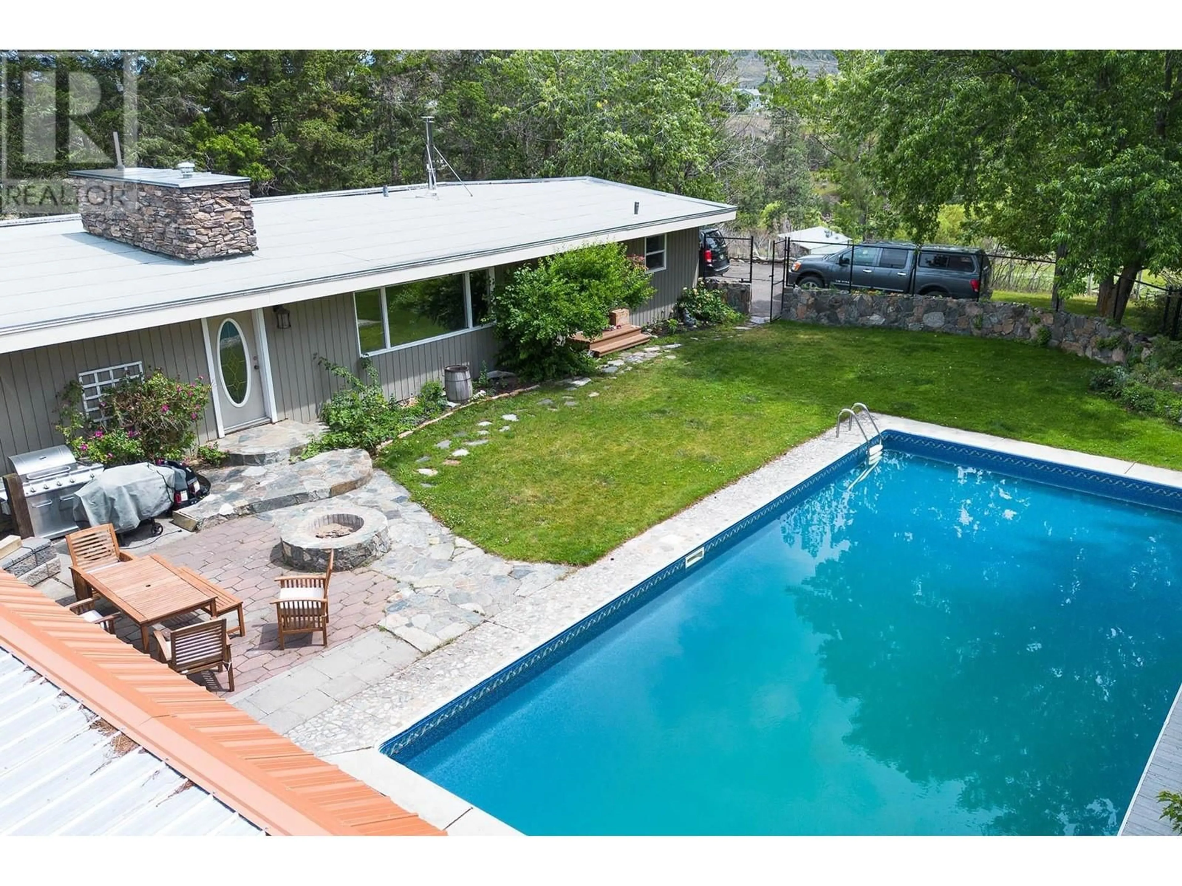 A pic from outside/outdoor area/front of a property/back of a property/a pic from drone, unknown for 7130 BLACKWELL Road, Kamloops British Columbia V2C6V8