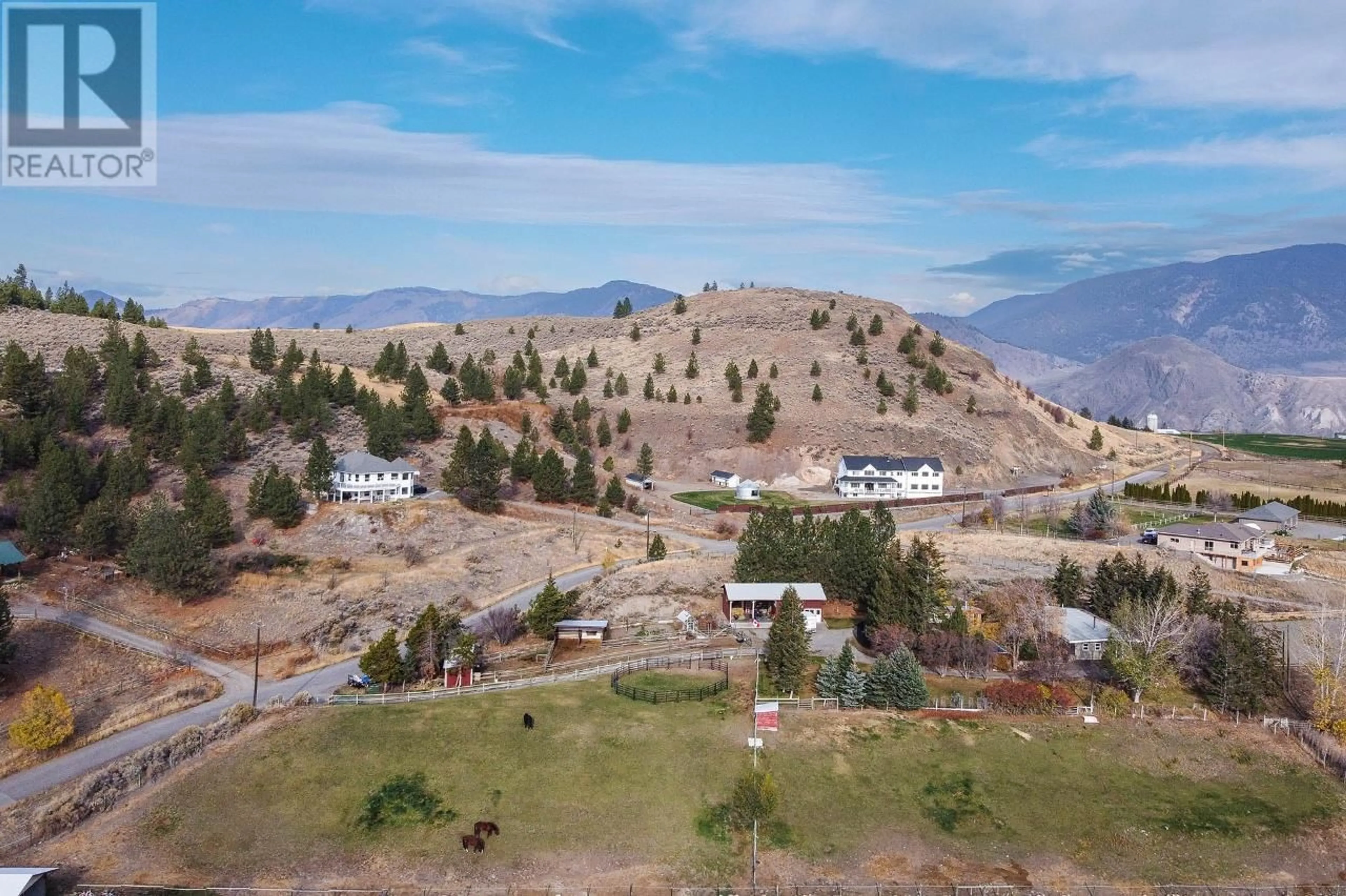 A pic from outside/outdoor area/front of a property/back of a property/a pic from drone, mountain view for 7130 BLACKWELL Road, Kamloops British Columbia V2C6V8