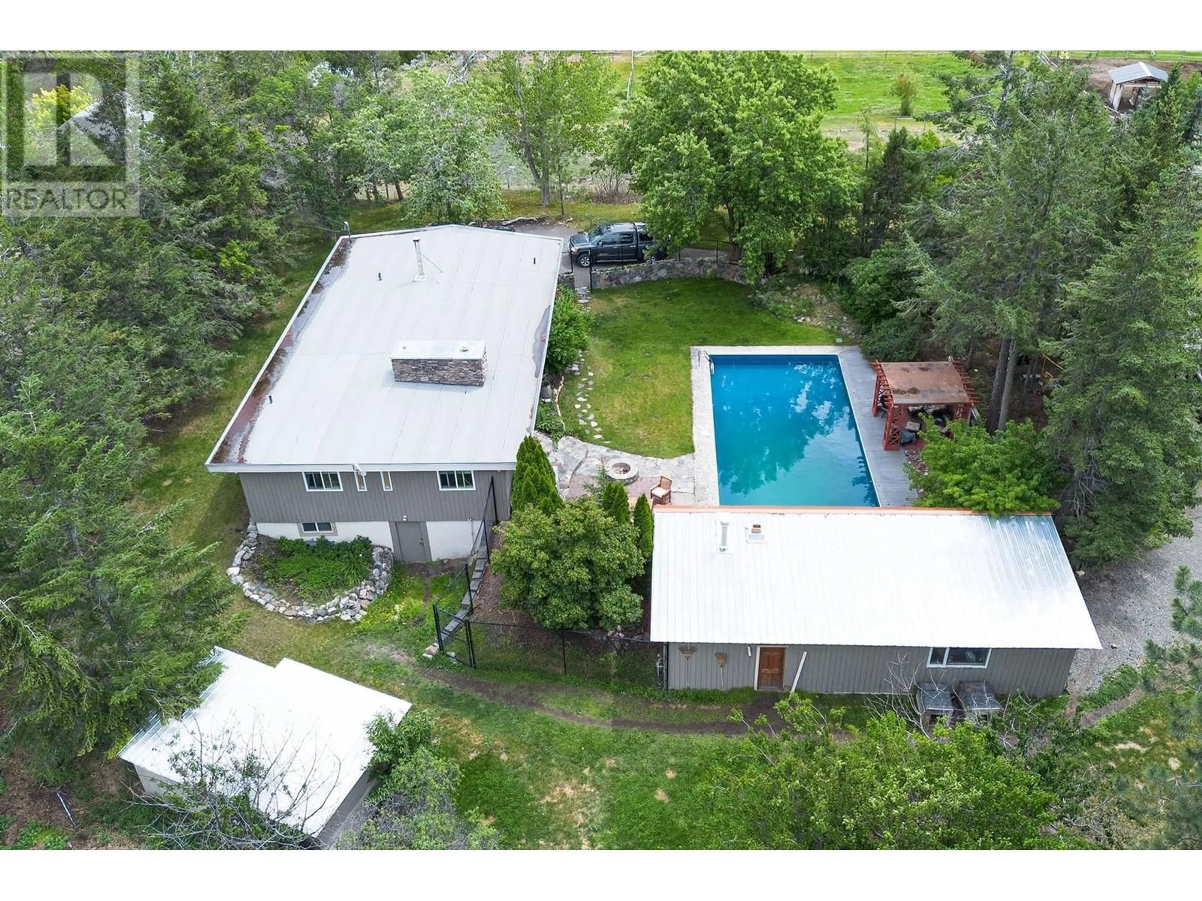 A pic from outside/outdoor area/front of a property/back of a property/a pic from drone, unknown for 7130 BLACKWELL Road, Kamloops British Columbia V2C6V8