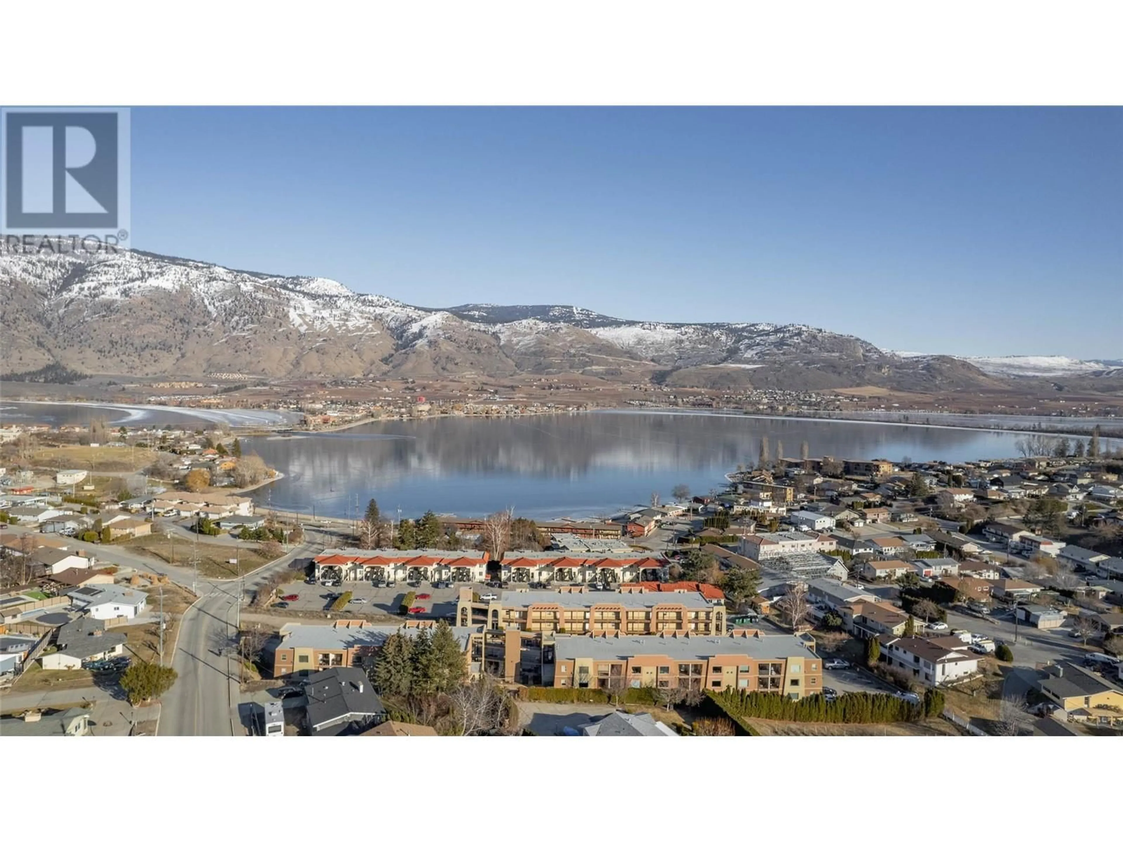 A pic from outside/outdoor area/front of a property/back of a property/a pic from drone, water/lake/river/ocean view for 109 - 9307 62ND AVENUE, Osoyoos British Columbia V0H1V1