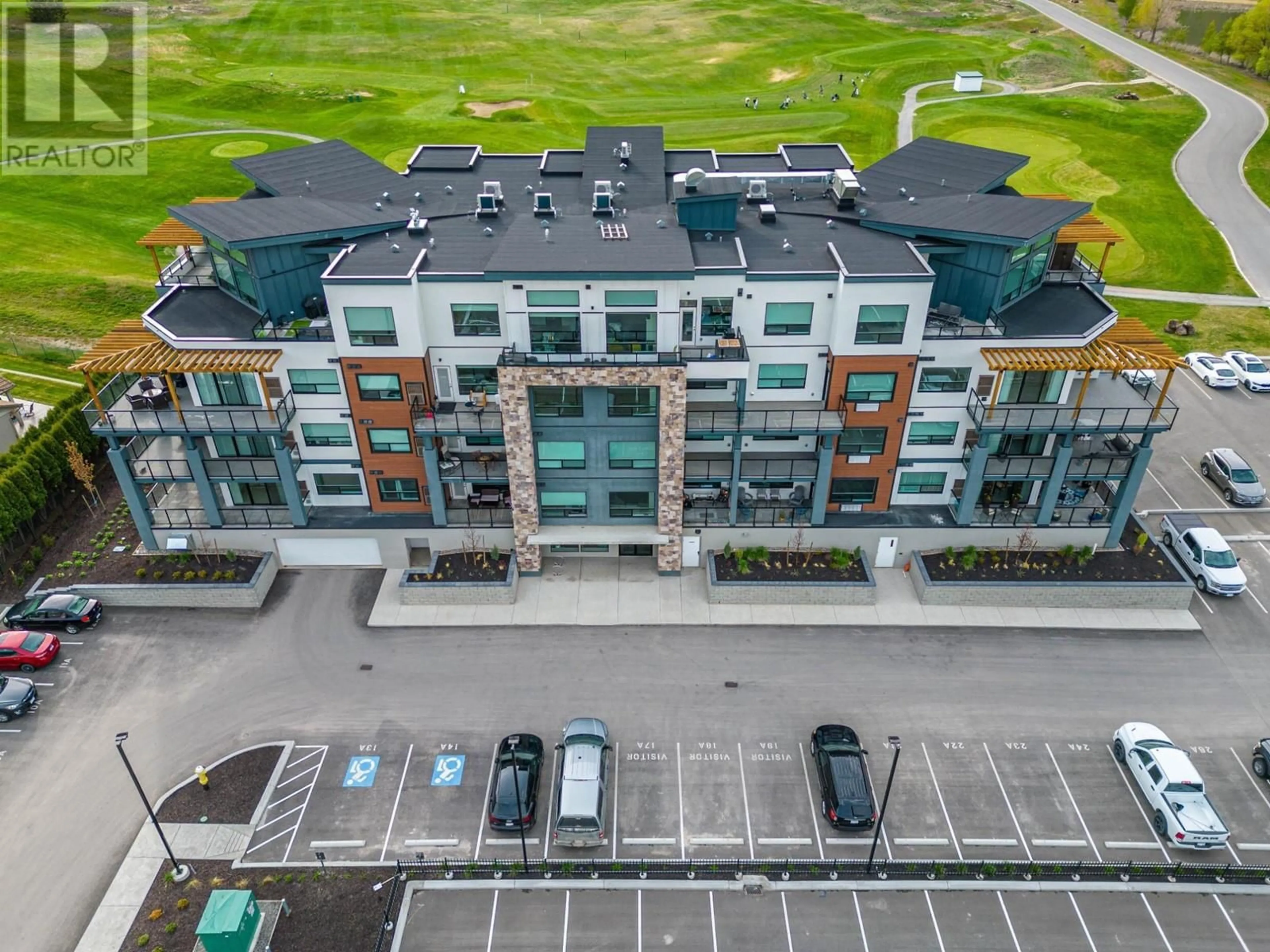 A pic from outside/outdoor area/front of a property/back of a property/a pic from drone, unknown for 651 DUNES Drive Unit# 401, Kamloops British Columbia V2B0K2