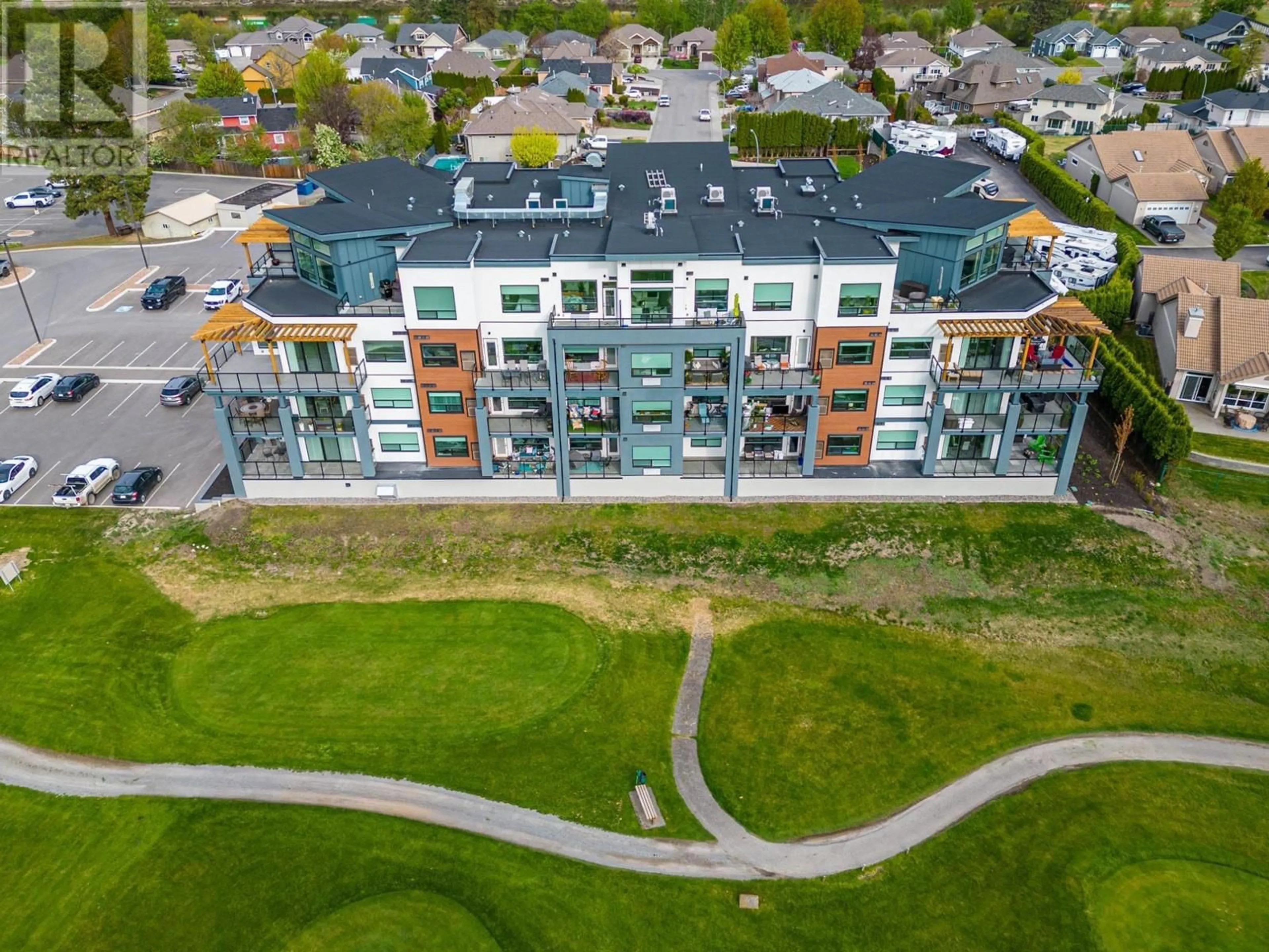 A pic from outside/outdoor area/front of a property/back of a property/a pic from drone, unknown for 651 DUNES Drive Unit# 401, Kamloops British Columbia V2B0K2