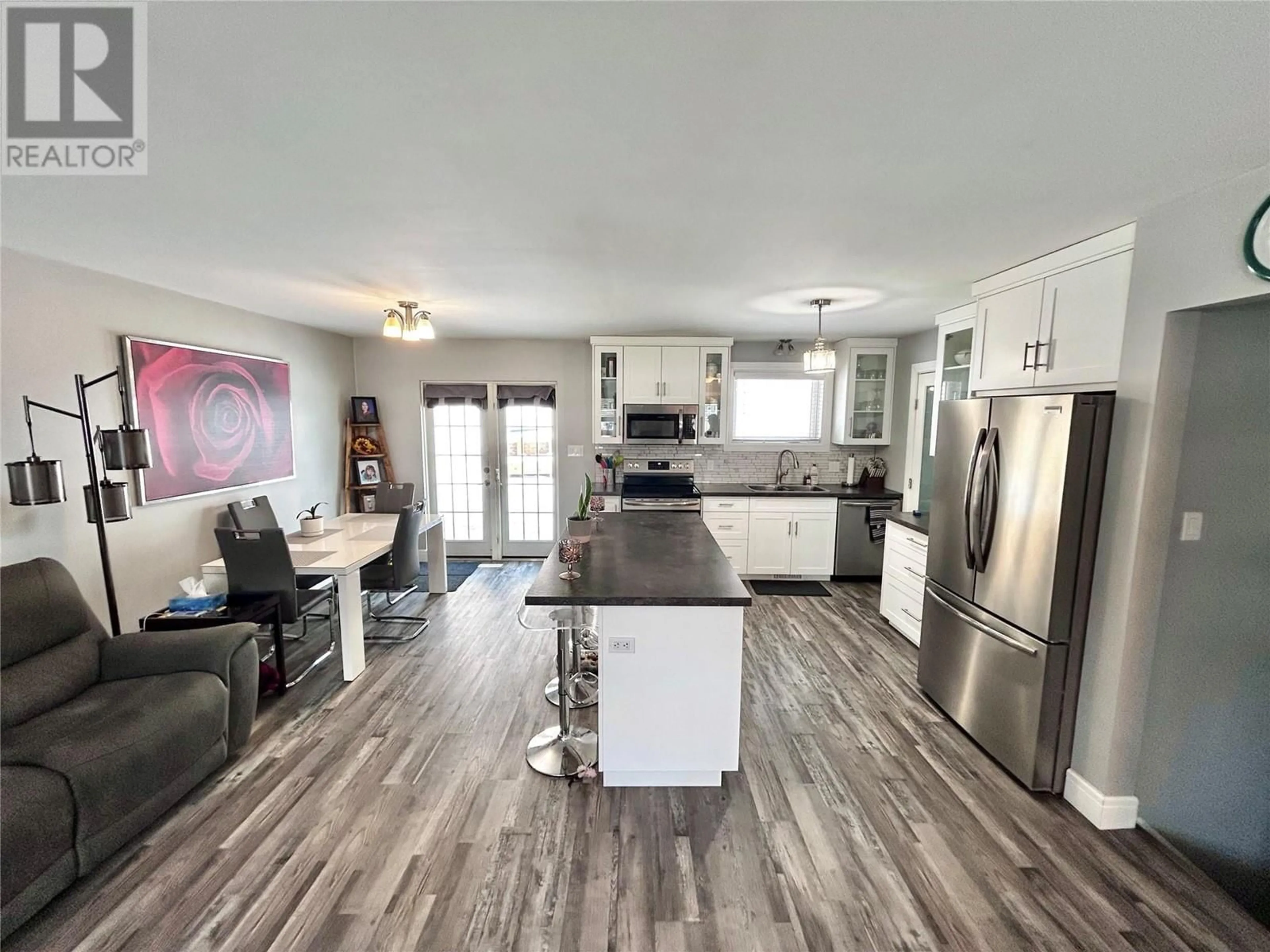 Open concept kitchen, unknown for 164 Gwillim Crescent, Tumbler Ridge British Columbia V0C2W0