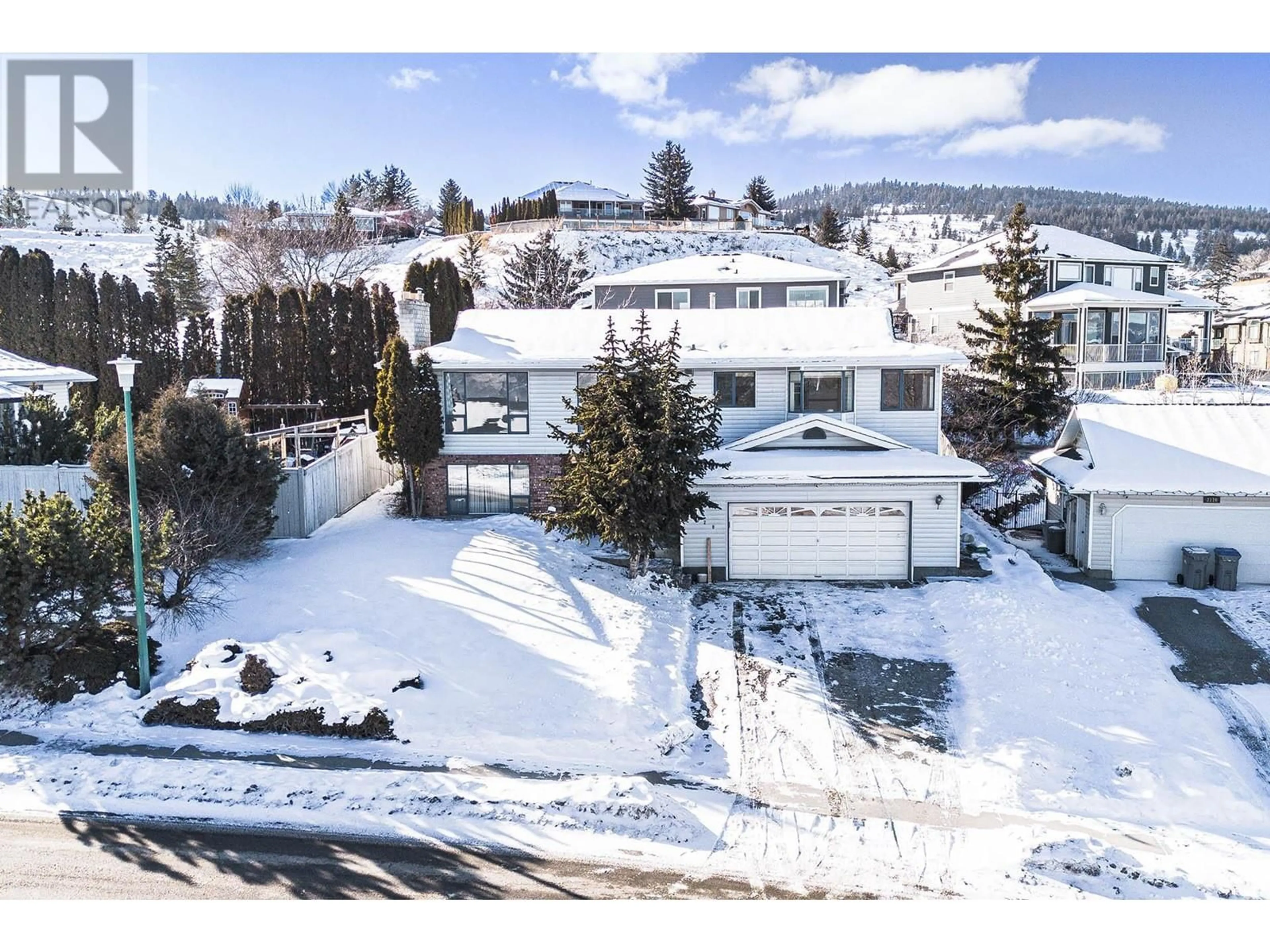 A pic from outside/outdoor area/front of a property/back of a property/a pic from drone, mountain view for 2120 GARYMEDE Drive, Kamloops British Columbia V1S1N8