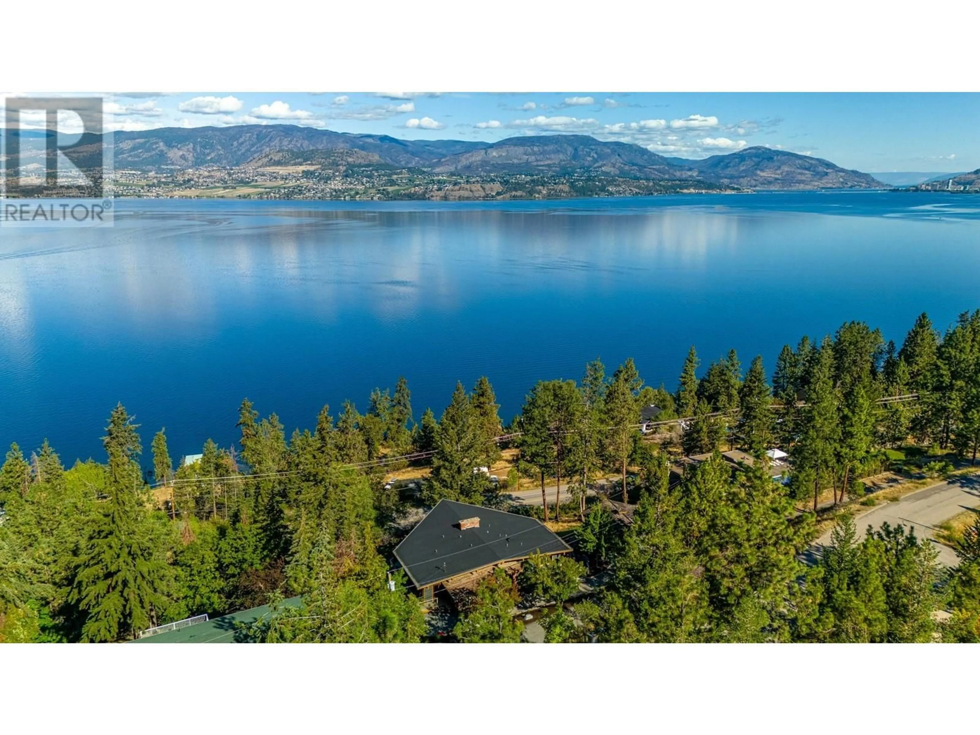 A pic from outside/outdoor area/front of a property/back of a property/a pic from drone, water/lake/river/ocean view for 404 Viewcrest Road, Kelowna British Columbia V1W4J8