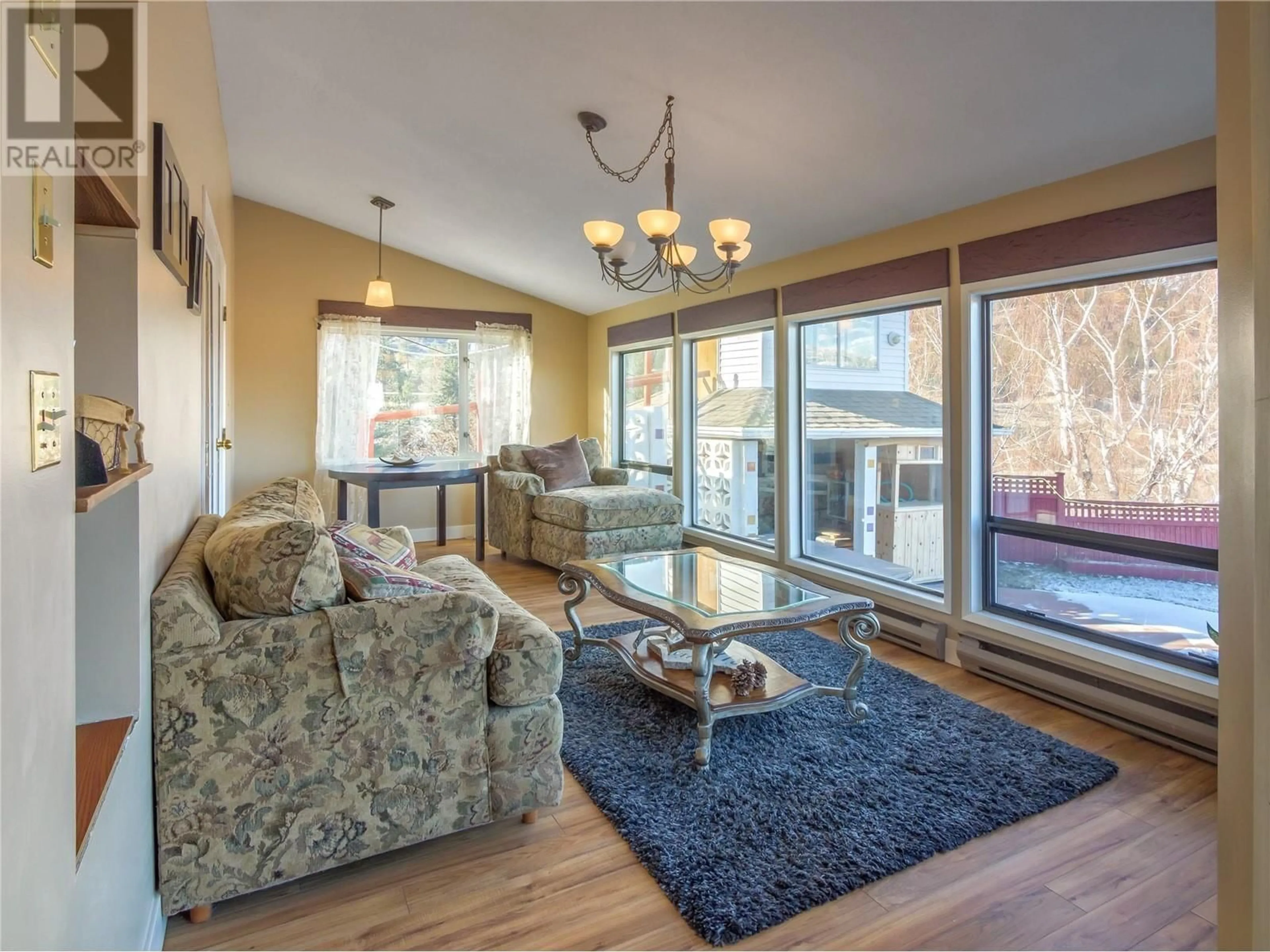 Living room with furniture, wood/laminate floor for 112 LAKEHILL ROAD, Kaleden British Columbia V0H1K0