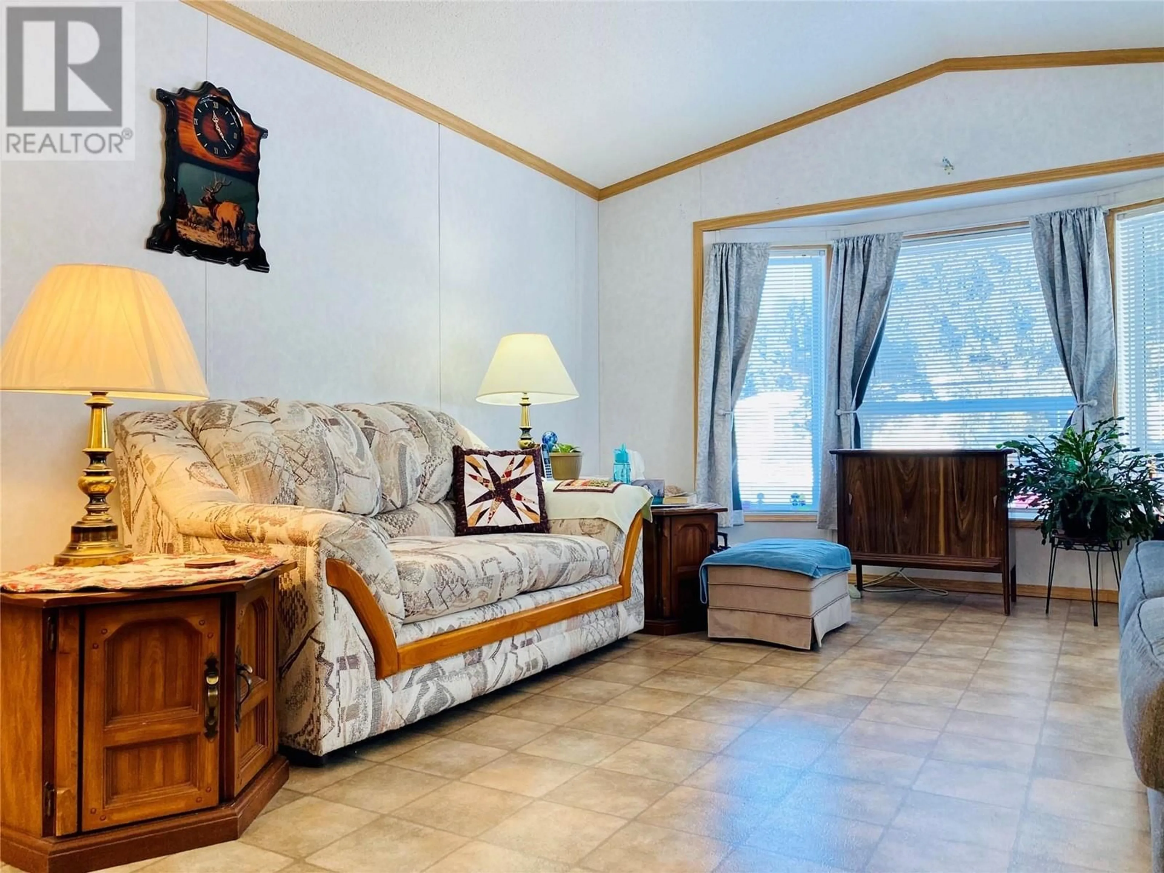 Living room with furniture, unknown for B4 - 5455 ALMOND GARDENS ROAD, Grand Forks British Columbia V0H1H4