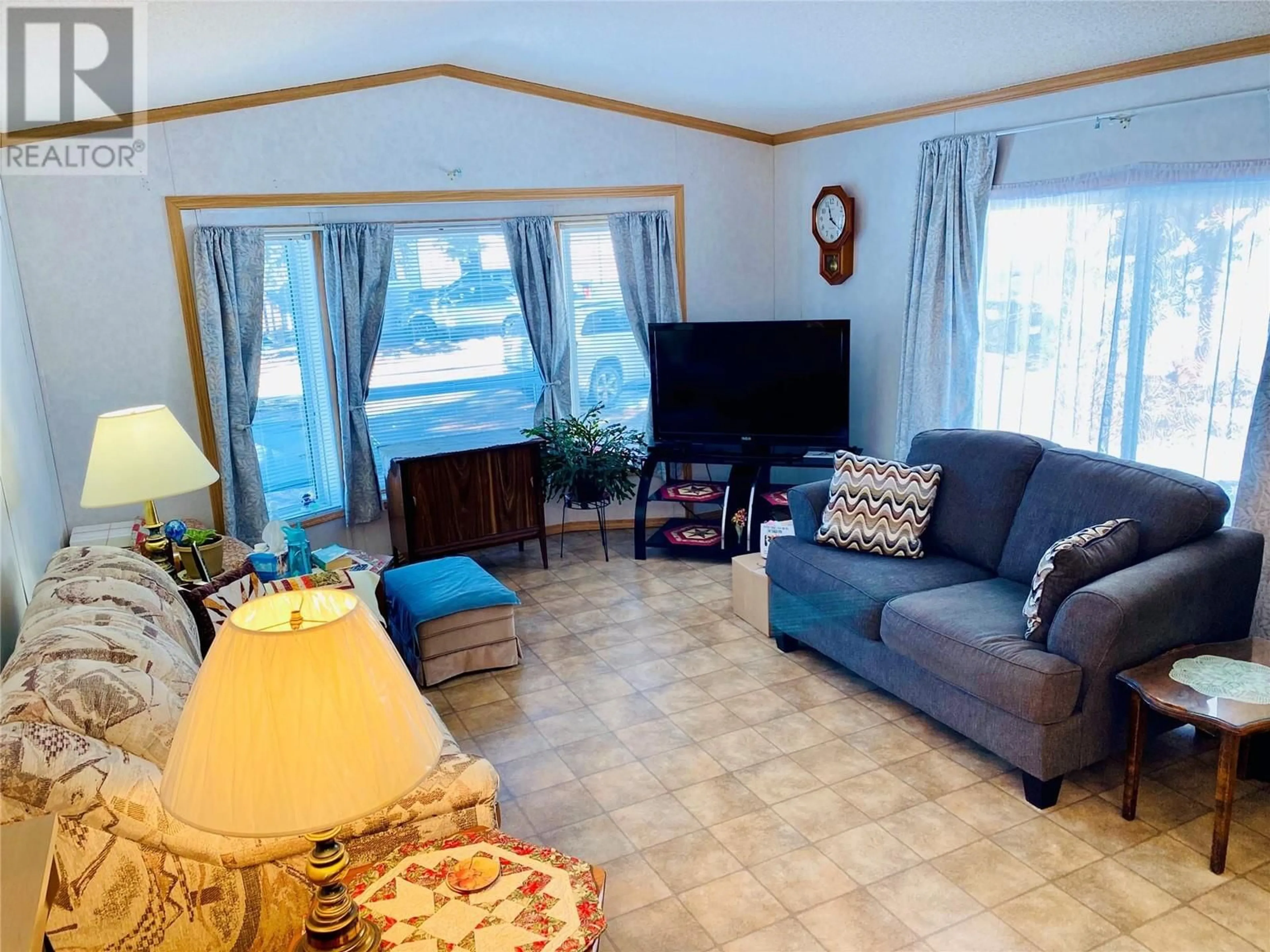 Living room with furniture, unknown for B4 - 5455 ALMOND GARDENS ROAD, Grand Forks British Columbia V0H1H4