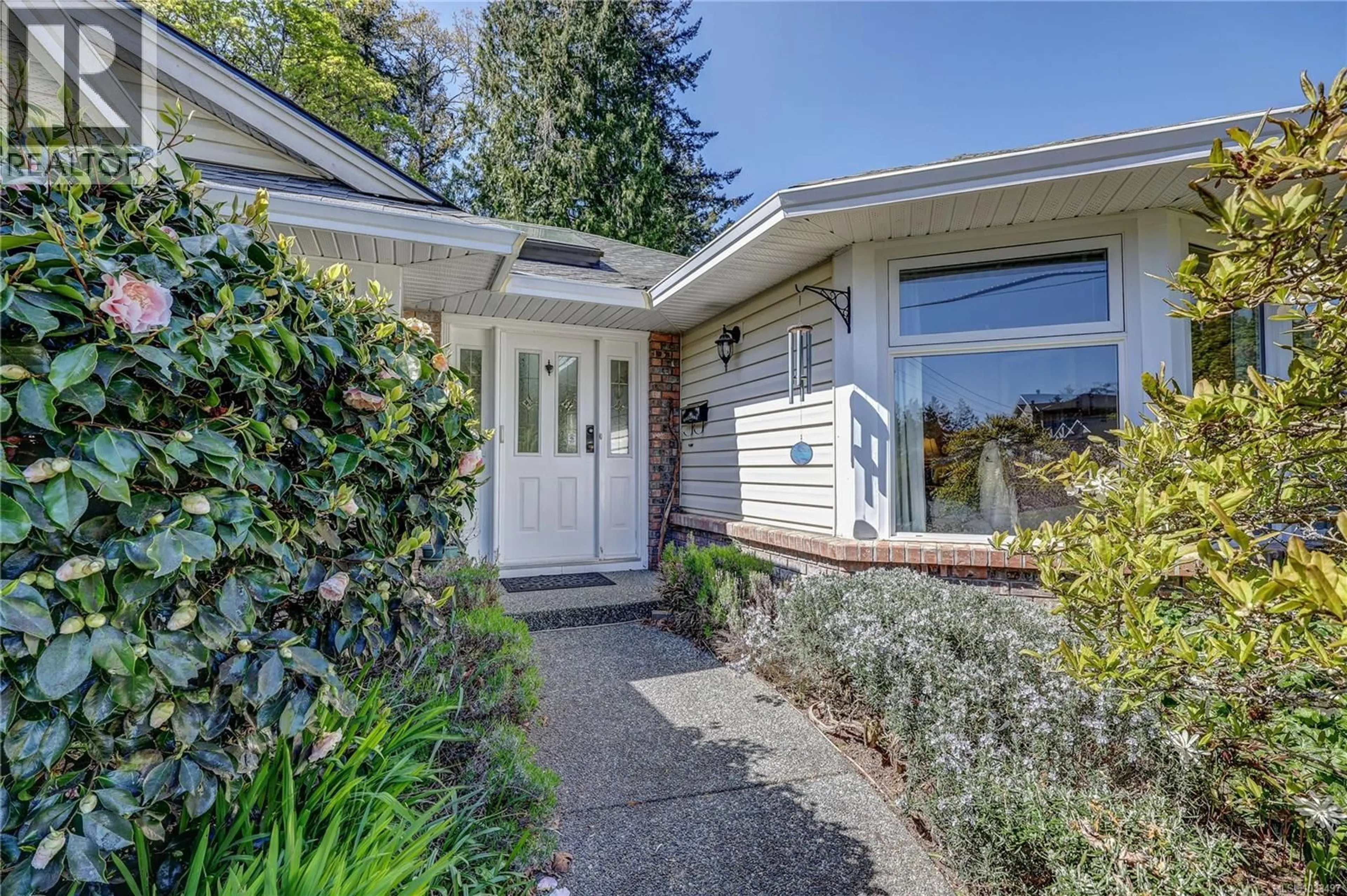 Home with vinyl exterior material, street for 1402 ROSE ANN DRIVE, Nanaimo British Columbia V9T3Z3