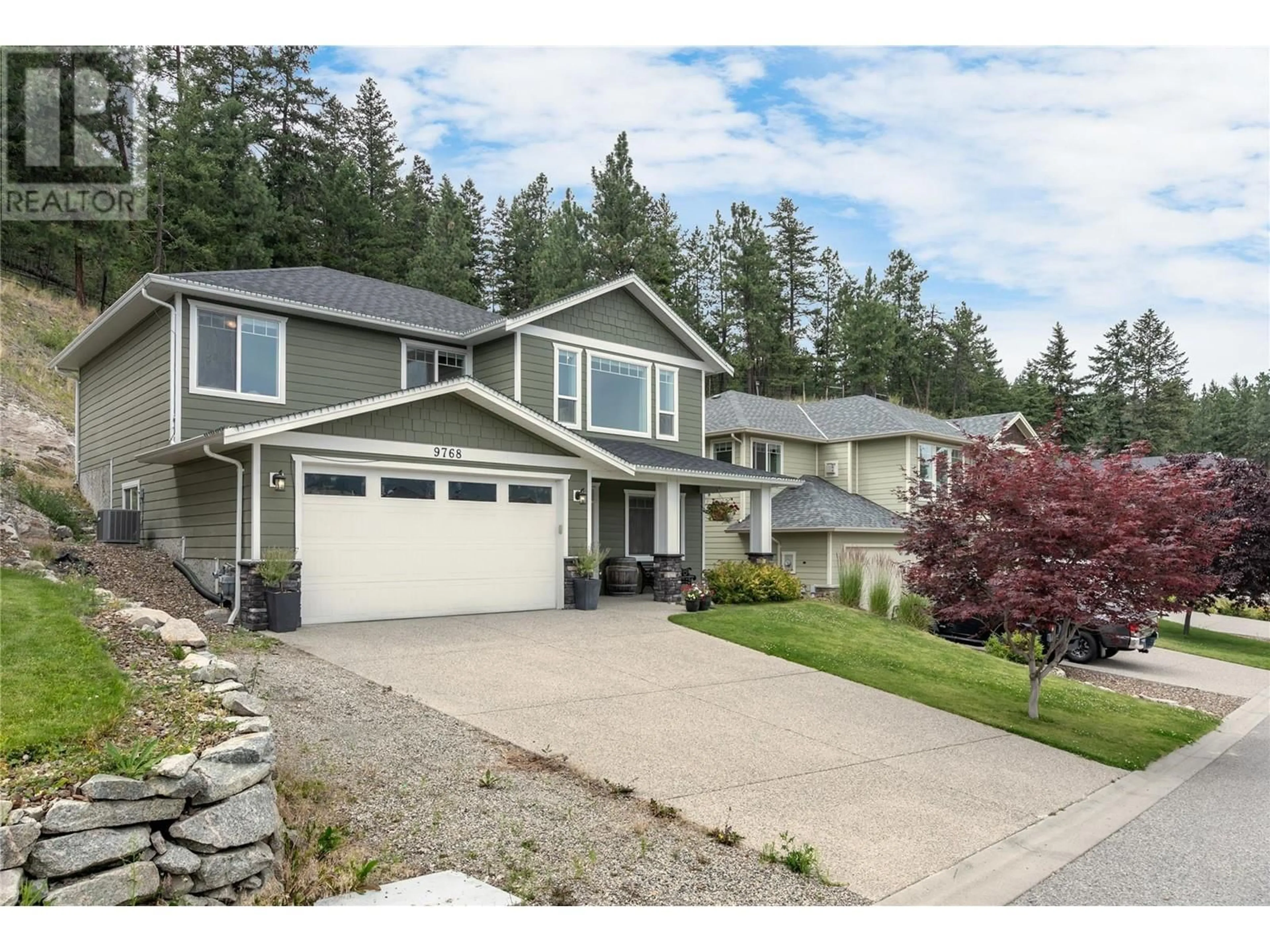 Home with vinyl exterior material, street for 9768 Santina Road, Lake Country British Columbia V4V2R9