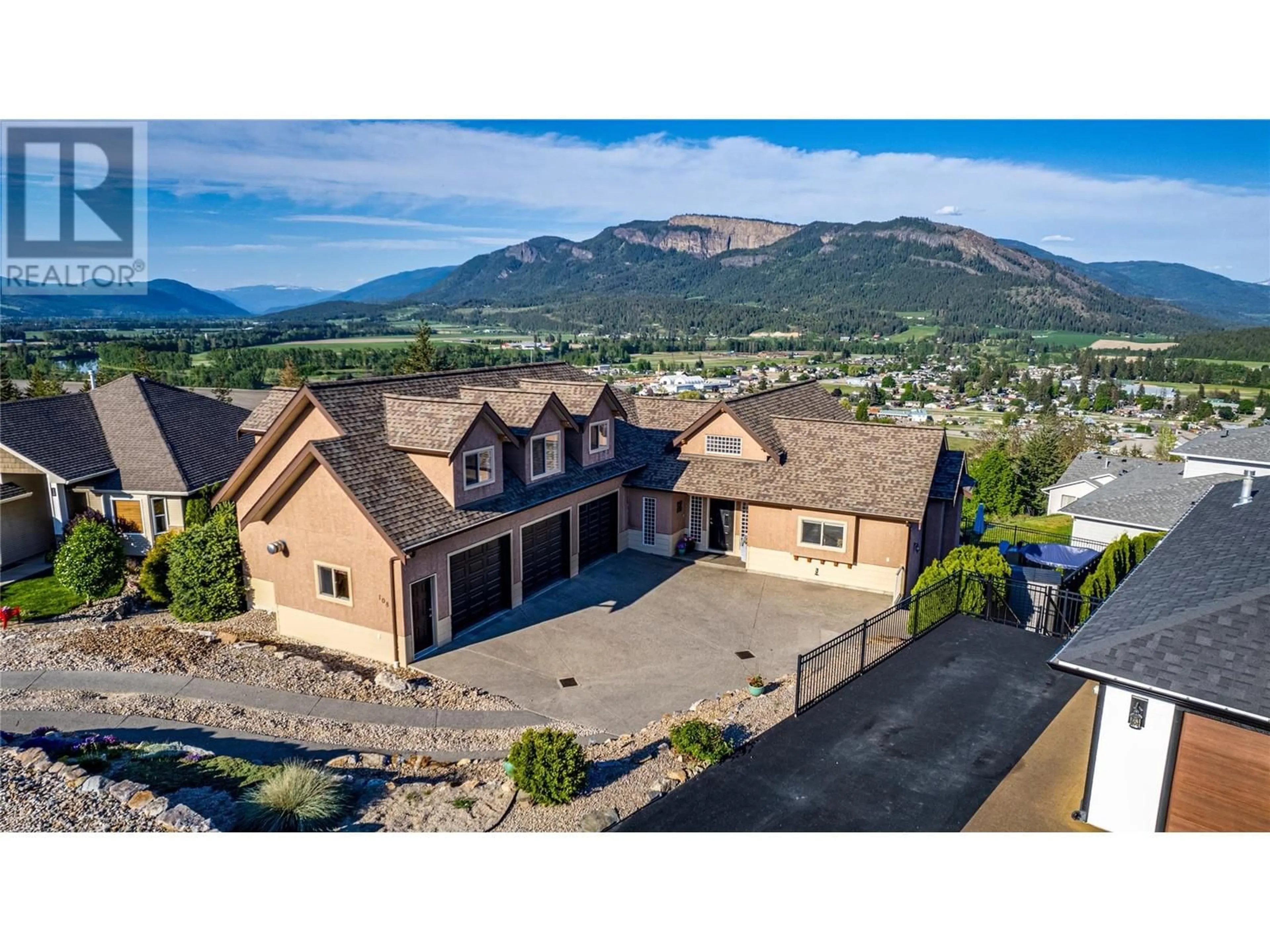 A pic from outside/outdoor area/front of a property/back of a property/a pic from drone, mountain view for 108 Red Rock Crescent, Enderby British Columbia V0E1V1