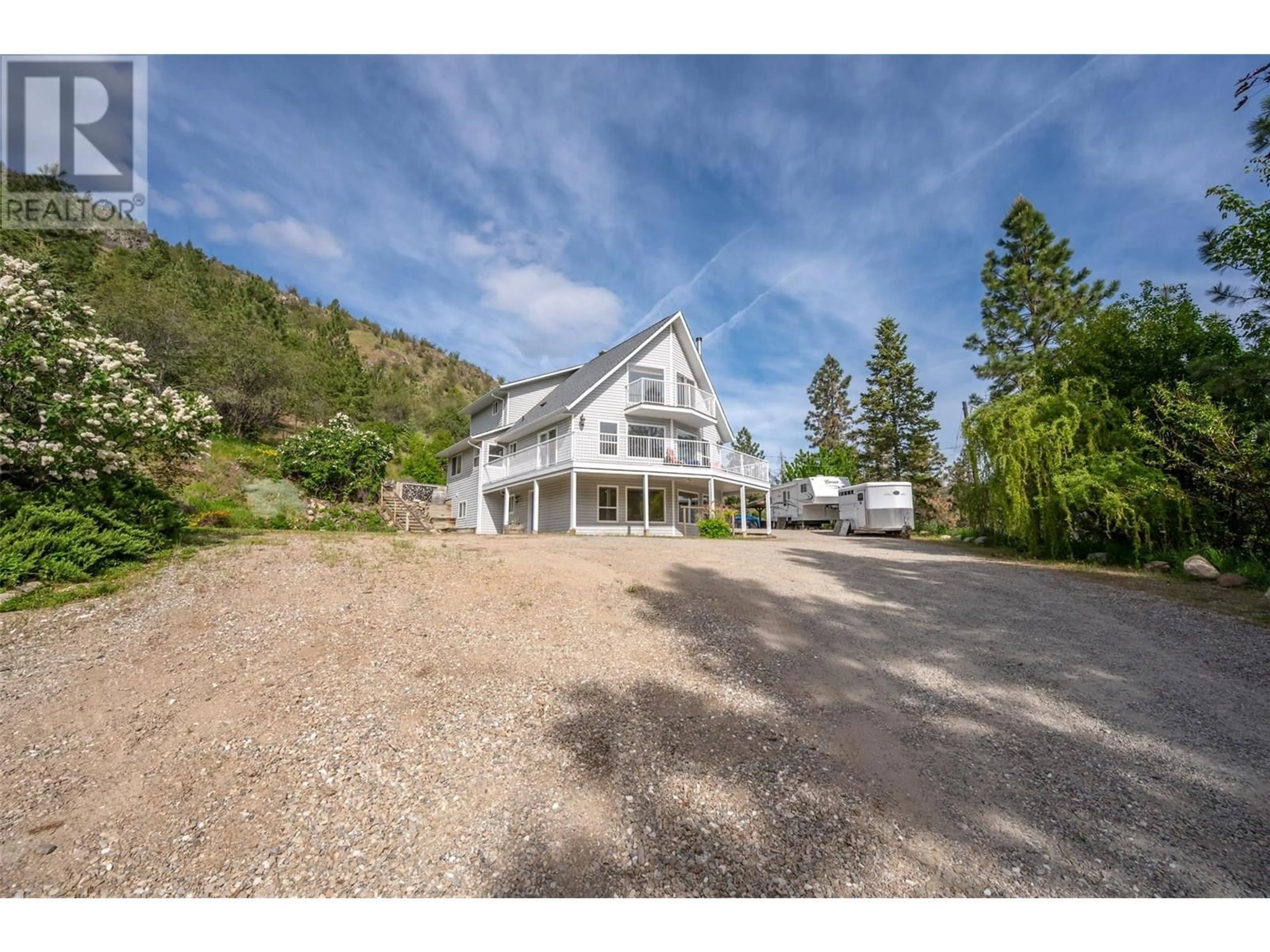 A pic from outside/outdoor area/front of a property/back of a property/a pic from drone, mountain view for 2737 Willowbrook Road, Oliver British Columbia V0H1T5