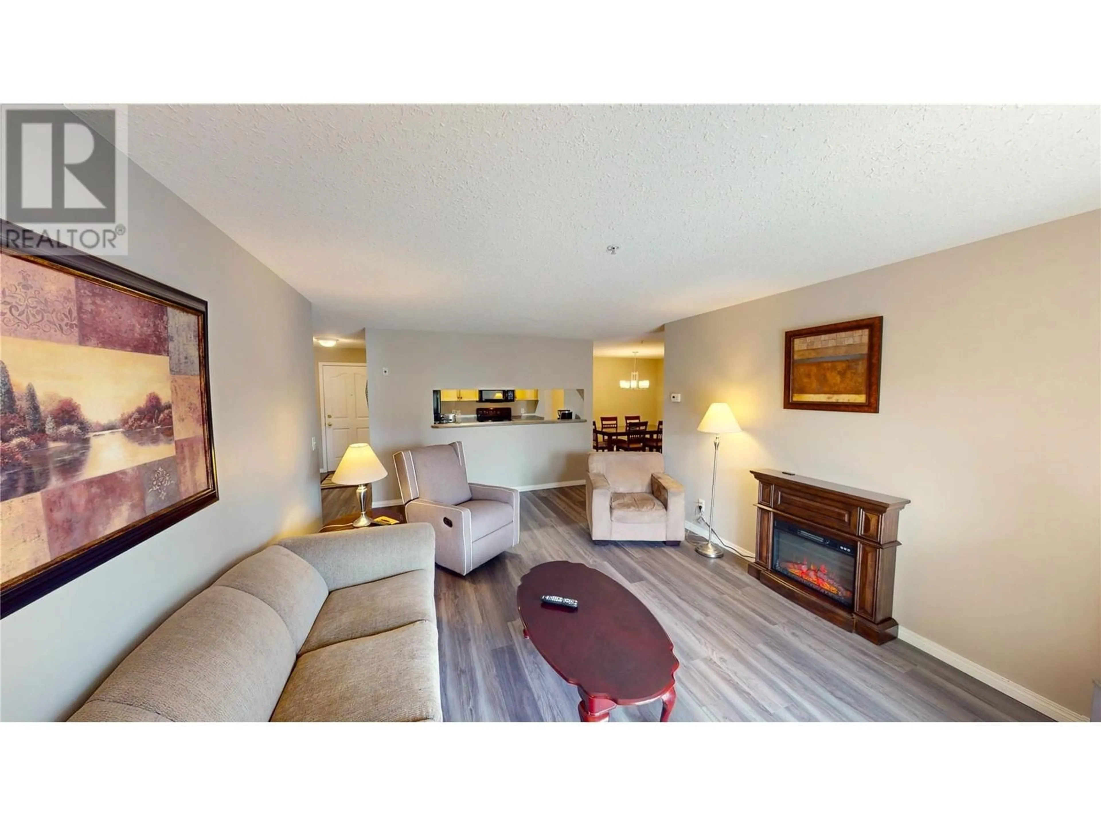 Living room with furniture, wood/laminate floor for 4769 FORSTERS LANDING Road Unit# 209, Radium Hot Springs British Columbia V0A1M0