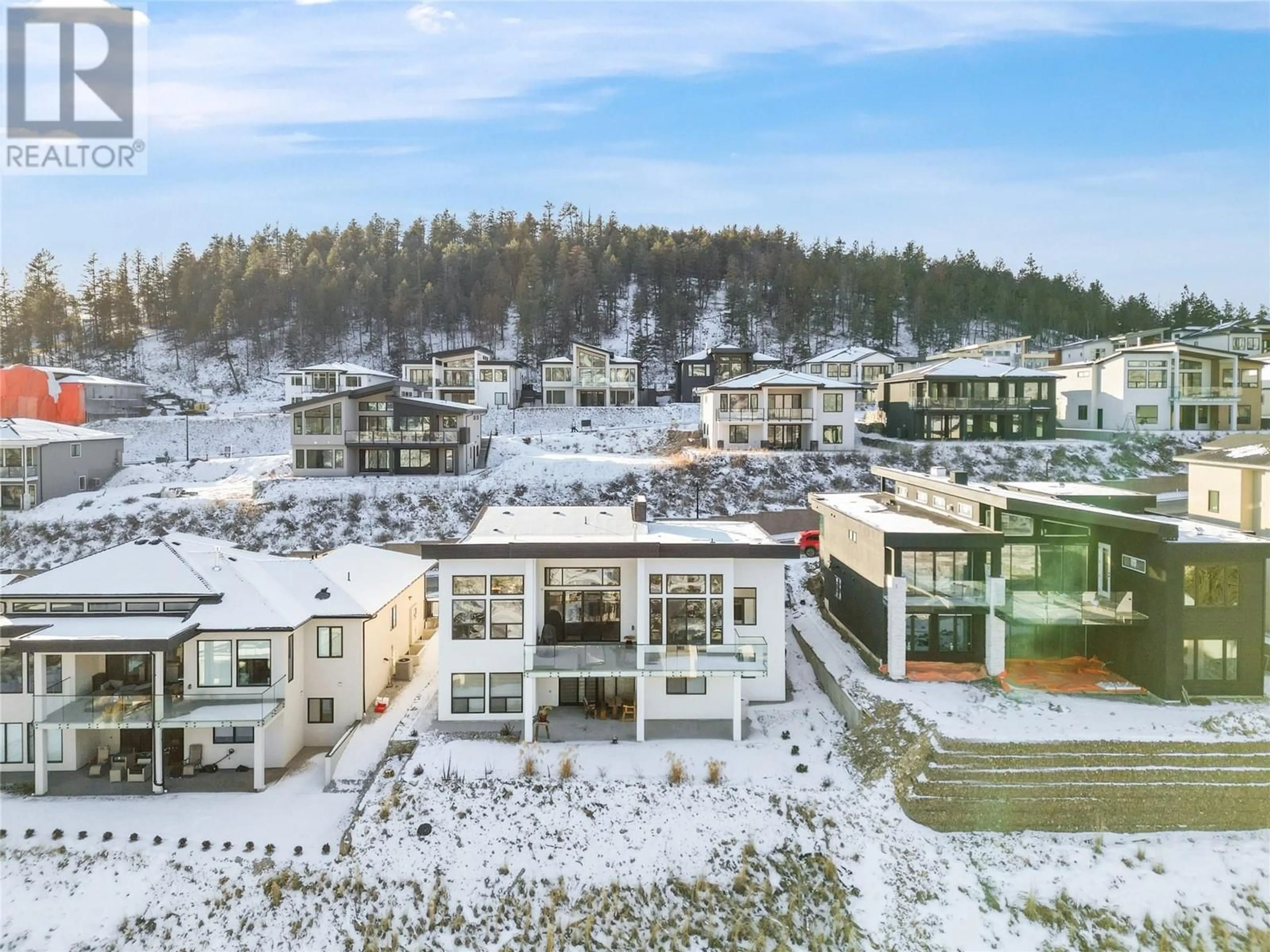 A pic from outside/outdoor area/front of a property/back of a property/a pic from drone, mountain view for 869 CARNOUSTIE DRIVE, Kelowna British Columbia V1P0A3