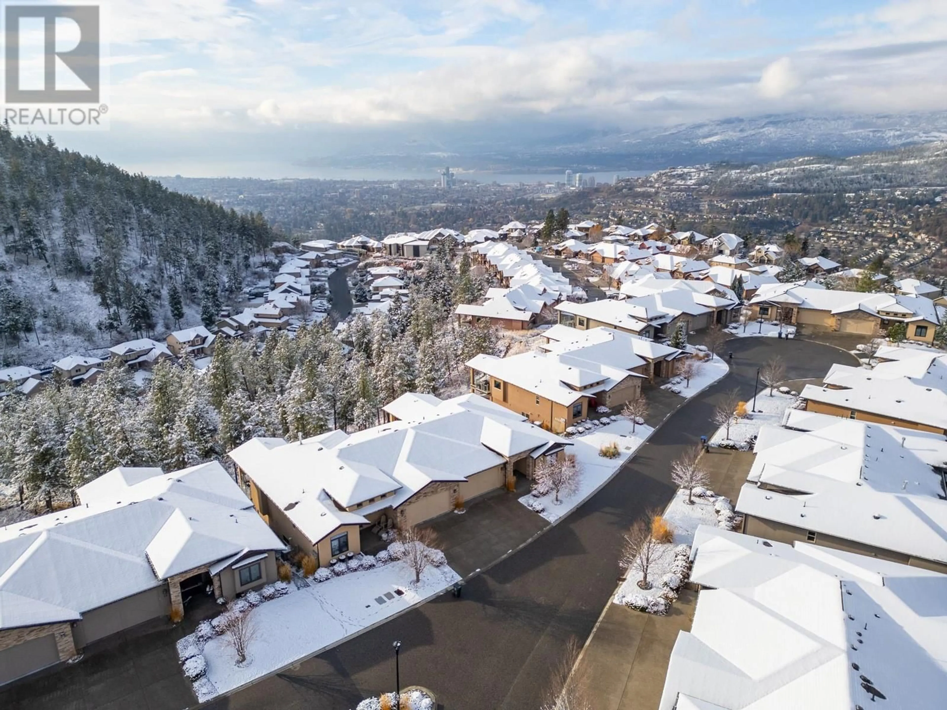 A pic from outside/outdoor area/front of a property/back of a property/a pic from drone, mountain view for 17 - 588 HARROGATE LANE, Kelowna British Columbia V1V3C1
