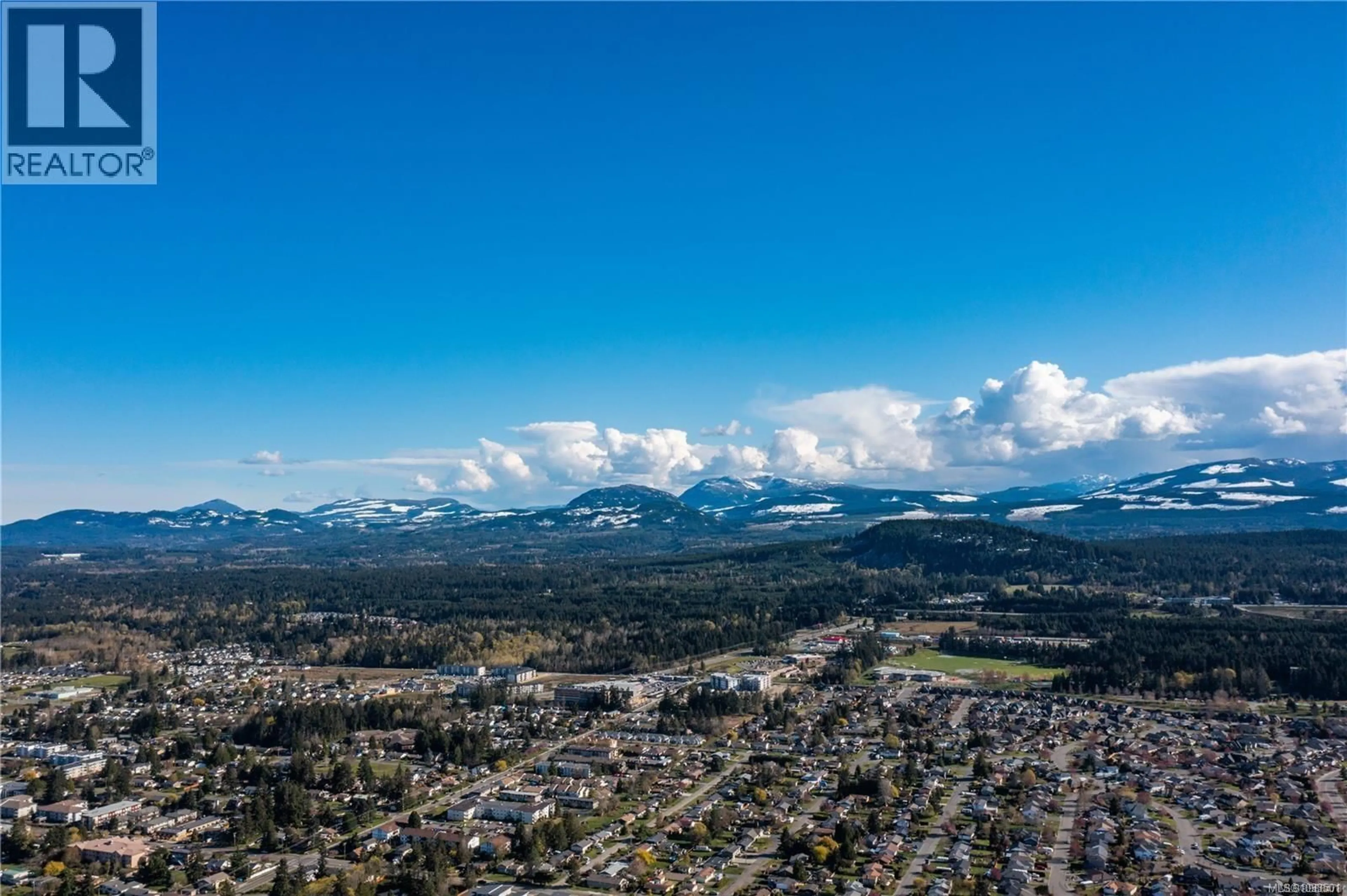 A pic from outside/outdoor area/front of a property/back of a property/a pic from drone, mountain view for 409 HUMMINGBIRD PLACE, Parksville British Columbia V9P1K1