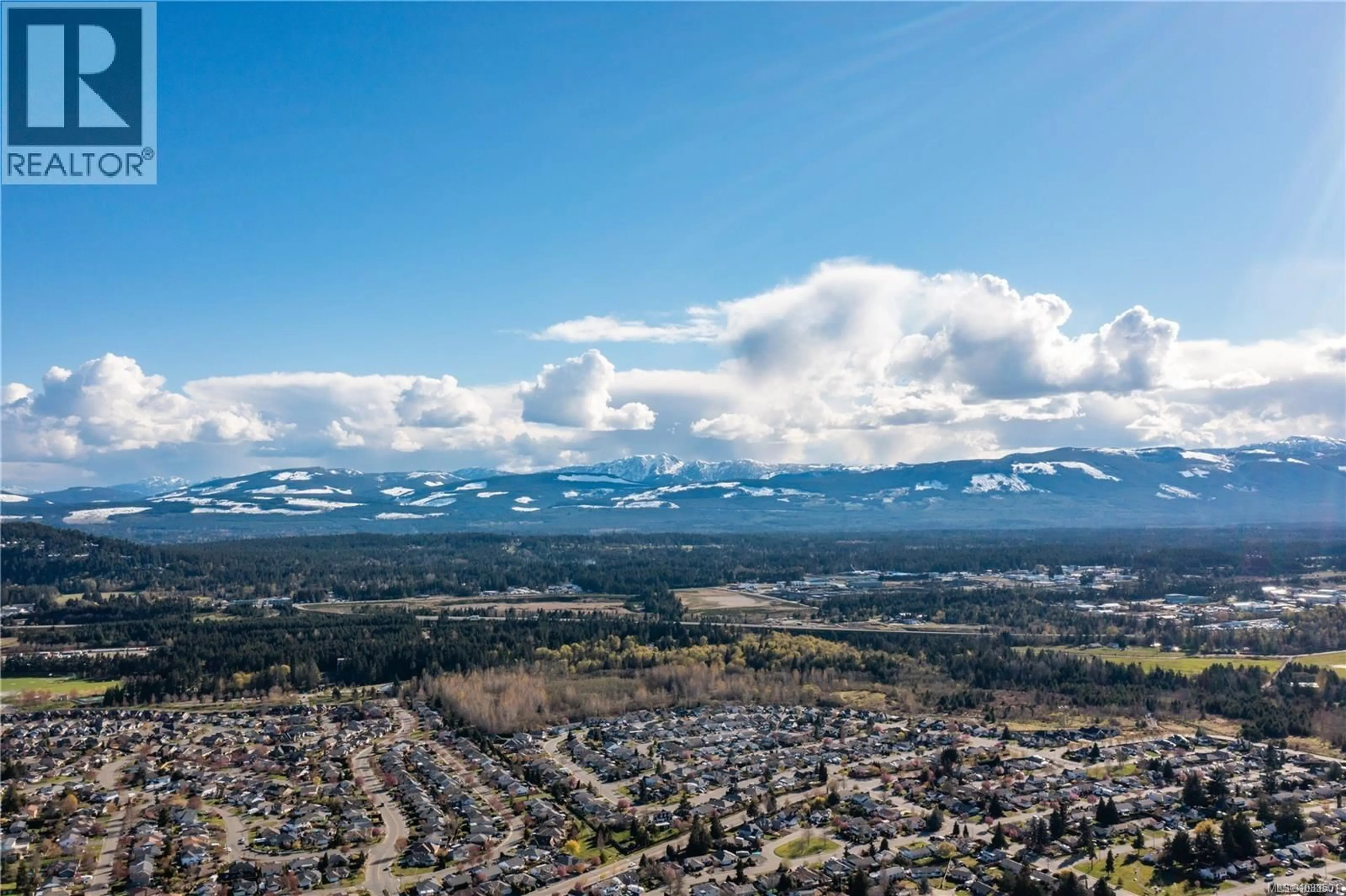 A pic from outside/outdoor area/front of a property/back of a property/a pic from drone, mountain view for 409 HUMMINGBIRD PLACE, Parksville British Columbia V9P1K1