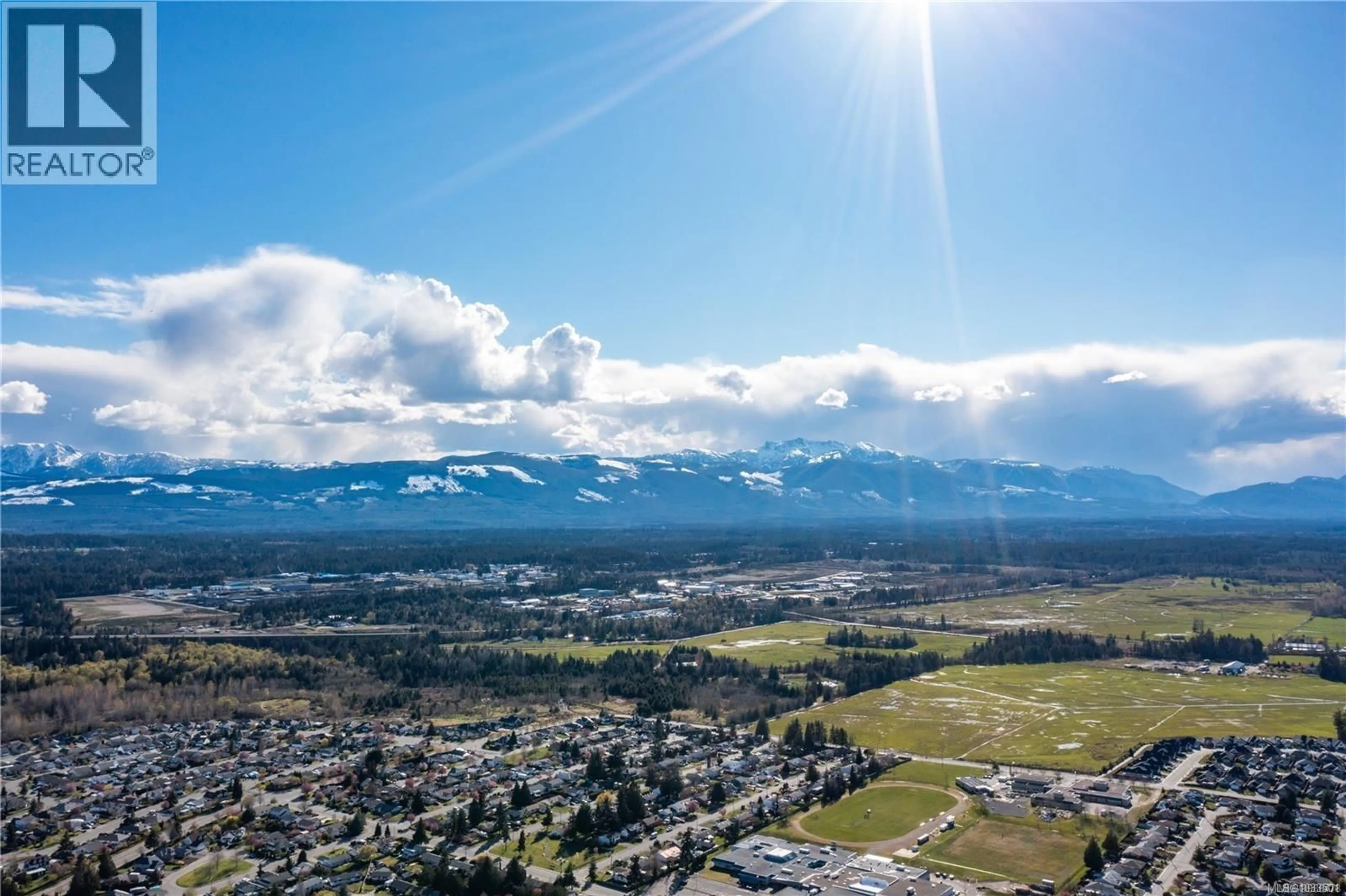 A pic from outside/outdoor area/front of a property/back of a property/a pic from drone, mountain view for 409 HUMMINGBIRD PLACE, Parksville British Columbia V9P1K1