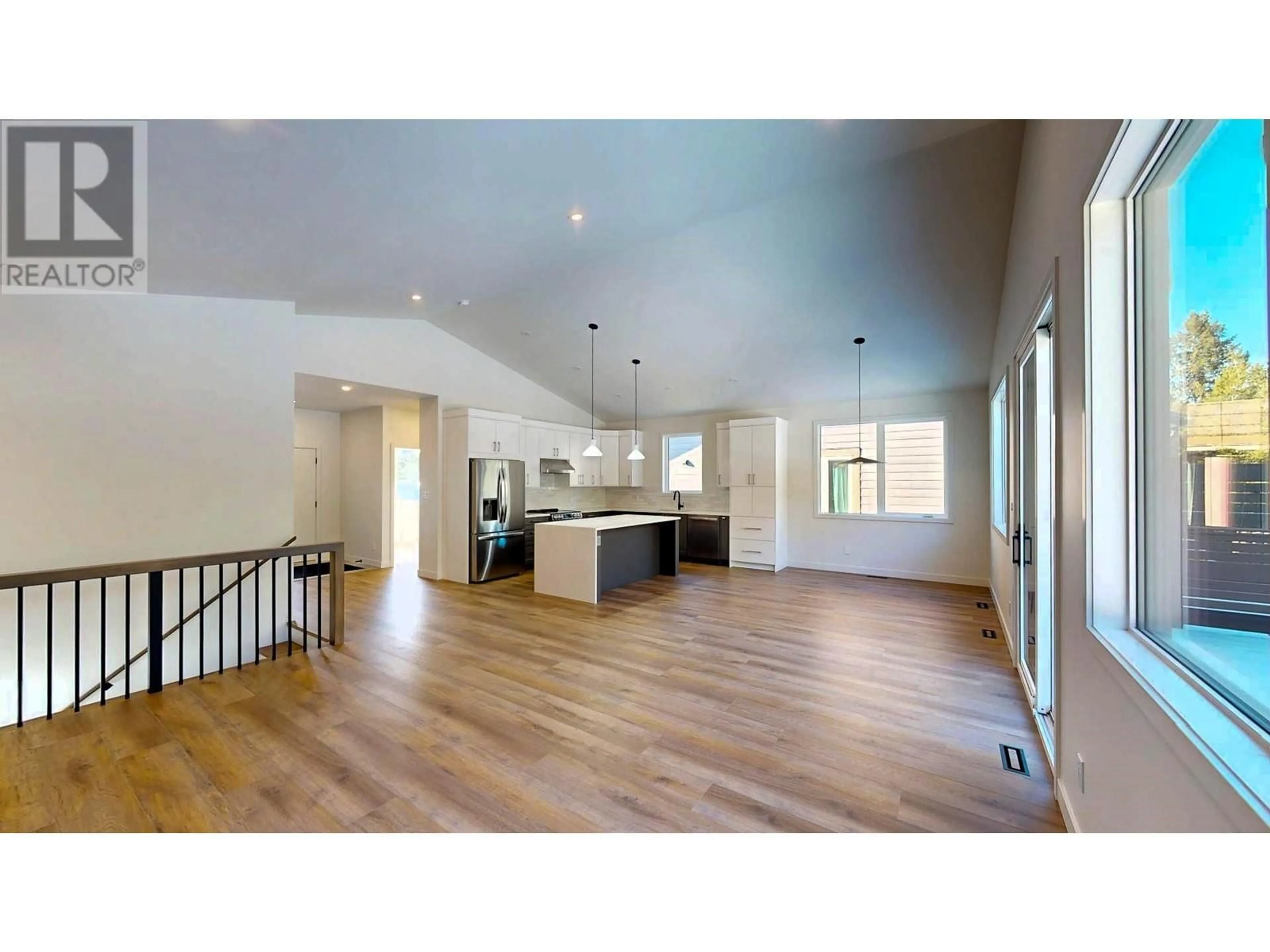 Open concept kitchen, wood/laminate floor for 930 COPPER POINT WAY, Windermere British Columbia V0A1K3