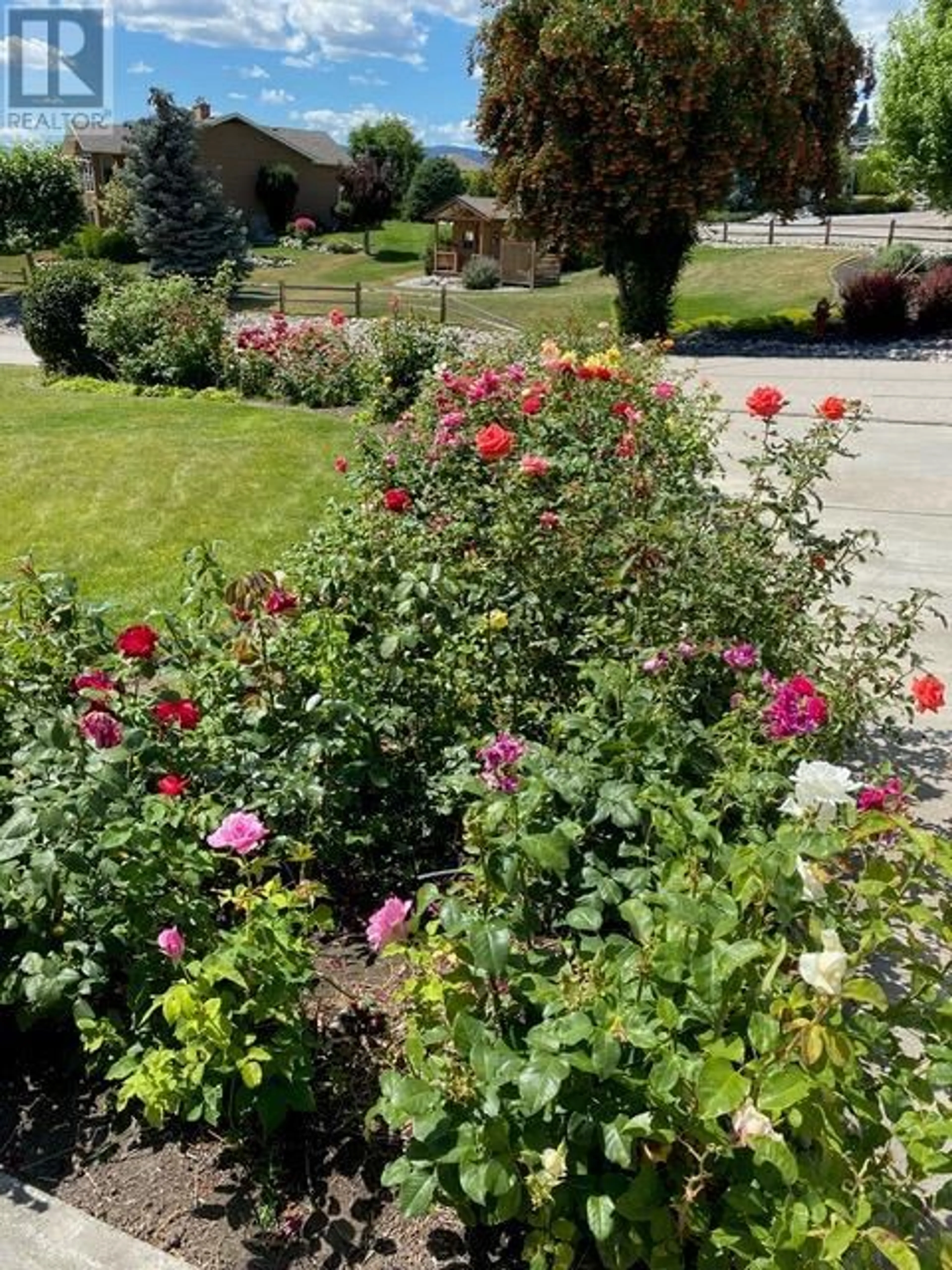 A pic from outside/outdoor area/front of a property/back of a property/a pic from drone, street for 1049 Kelly Drive, West Kelowna British Columbia V1Z2T1