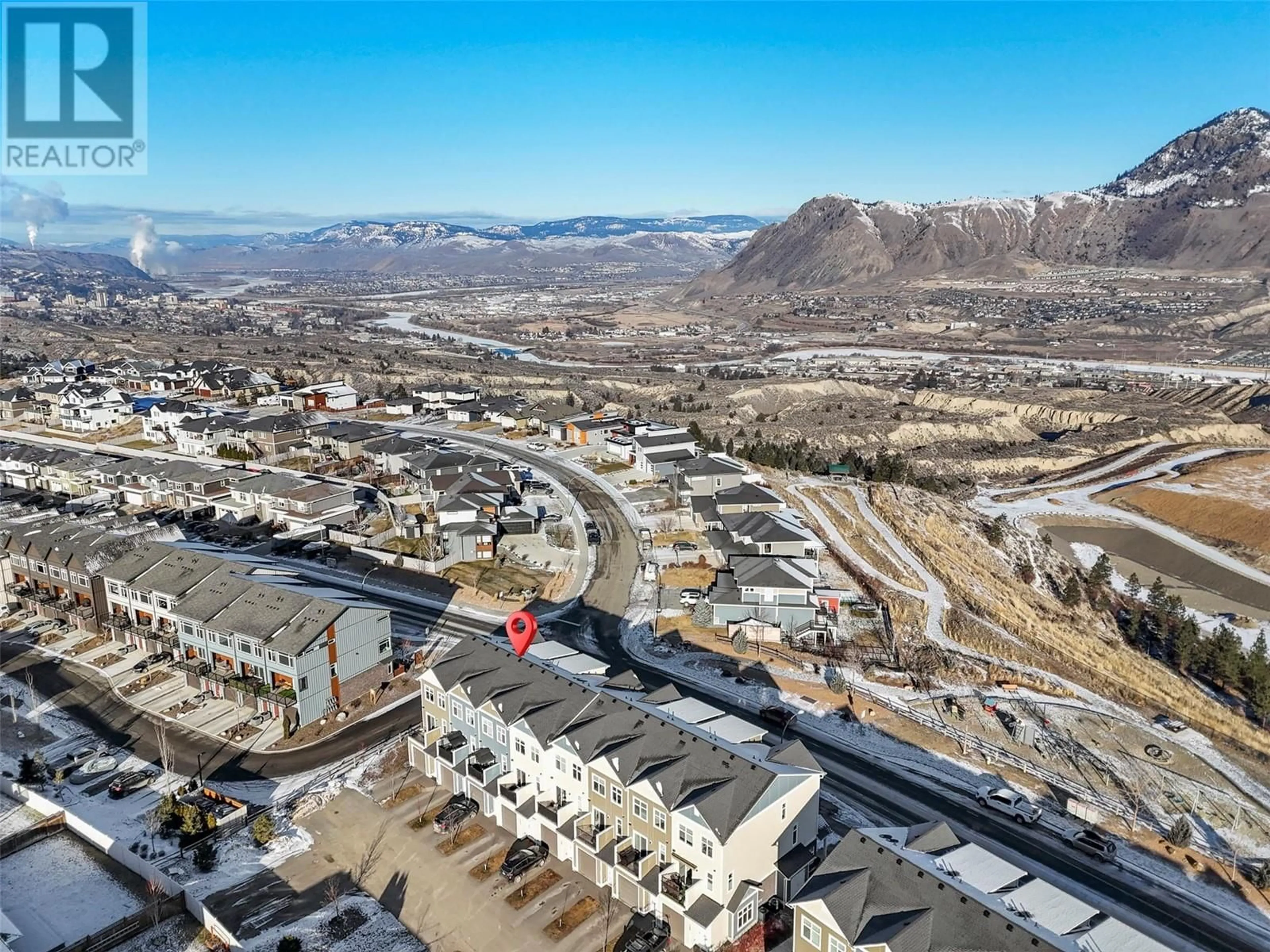 A pic from outside/outdoor area/front of a property/back of a property/a pic from drone, mountain view for 1951 QU'APPELLE Boulevard Unit# 102, Kamloops British Columbia V2E0C8