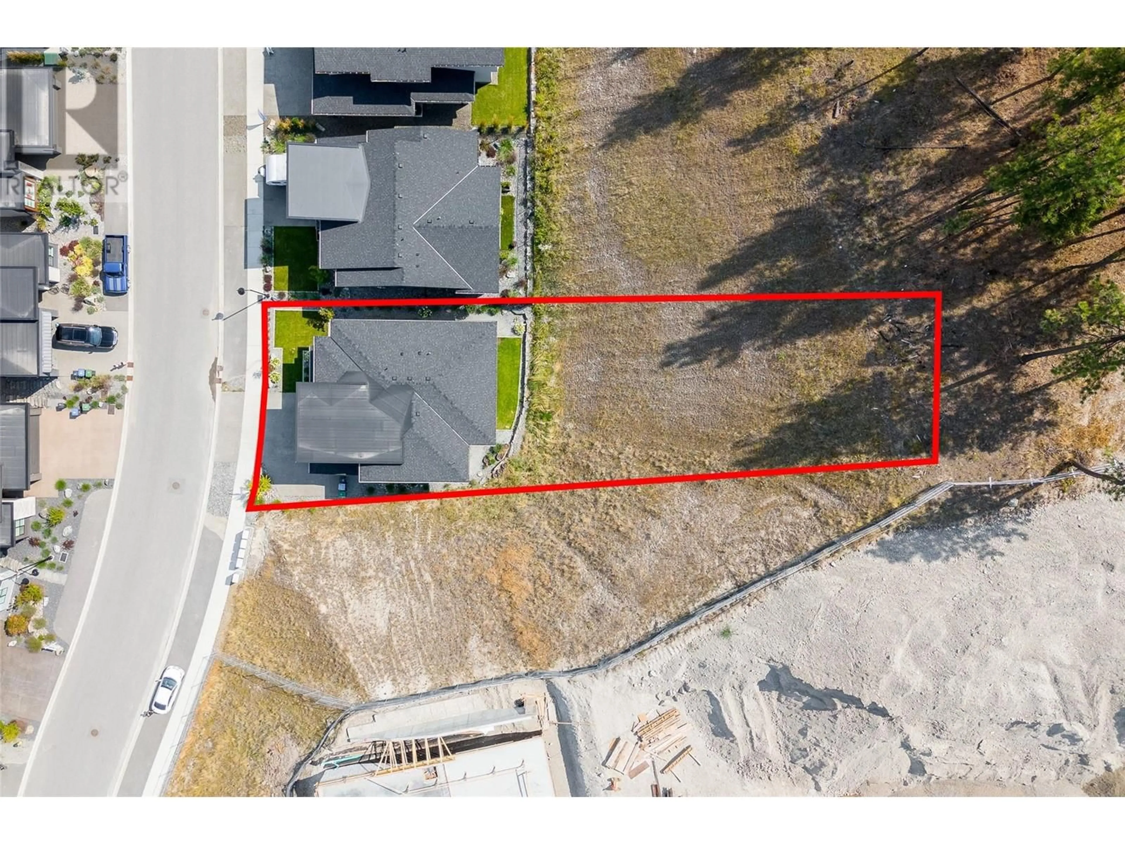 A pic from outside/outdoor area/front of a property/back of a property/a pic from drone, street for 1901 Northern Flicker Court, Kelowna British Columbia V1V0G3