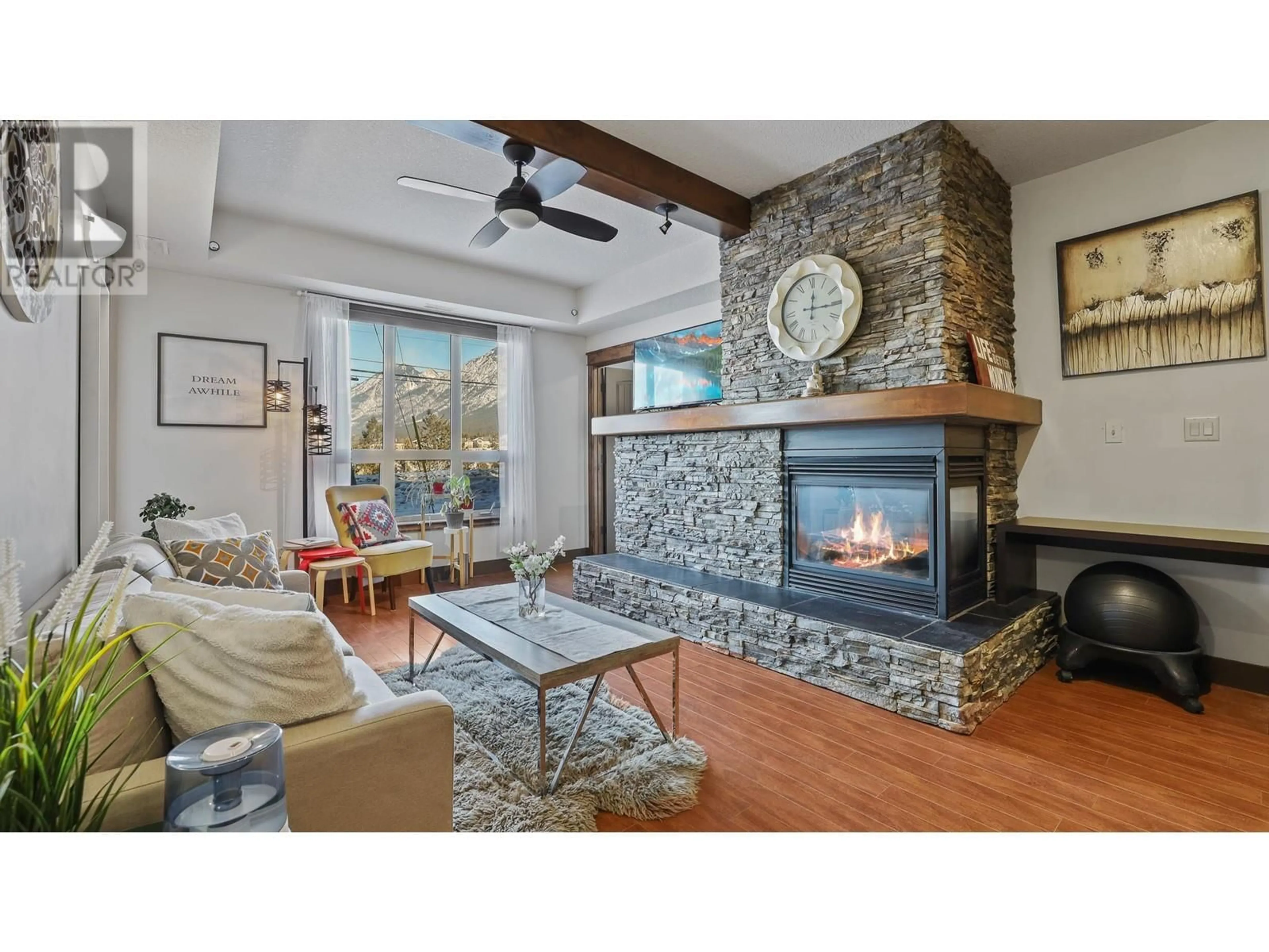 Living room with furniture, ceramic/tile floor for 7495 Columbia Avenue Unit# 1104, Radium Hot Springs British Columbia V0A1M0