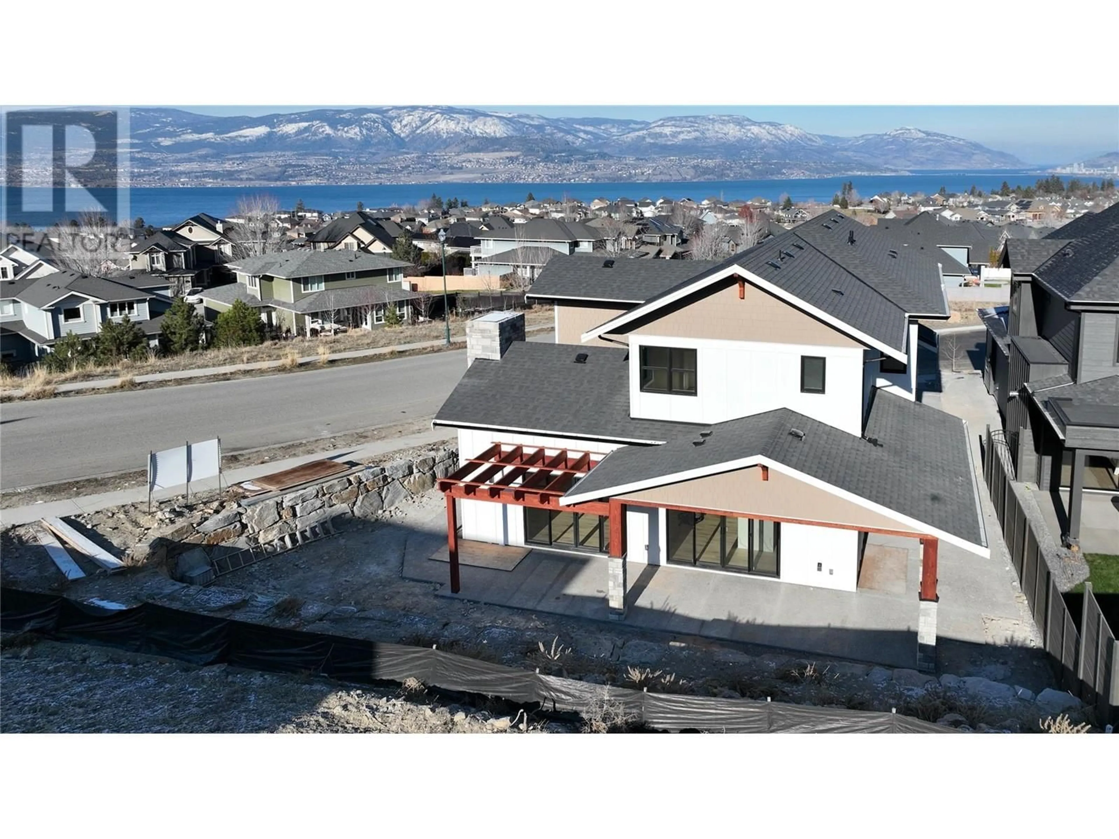 A pic from outside/outdoor area/front of a property/back of a property/a pic from drone, mountain view for 5557 Foothill Court, Kelowna British Columbia V1W5A8