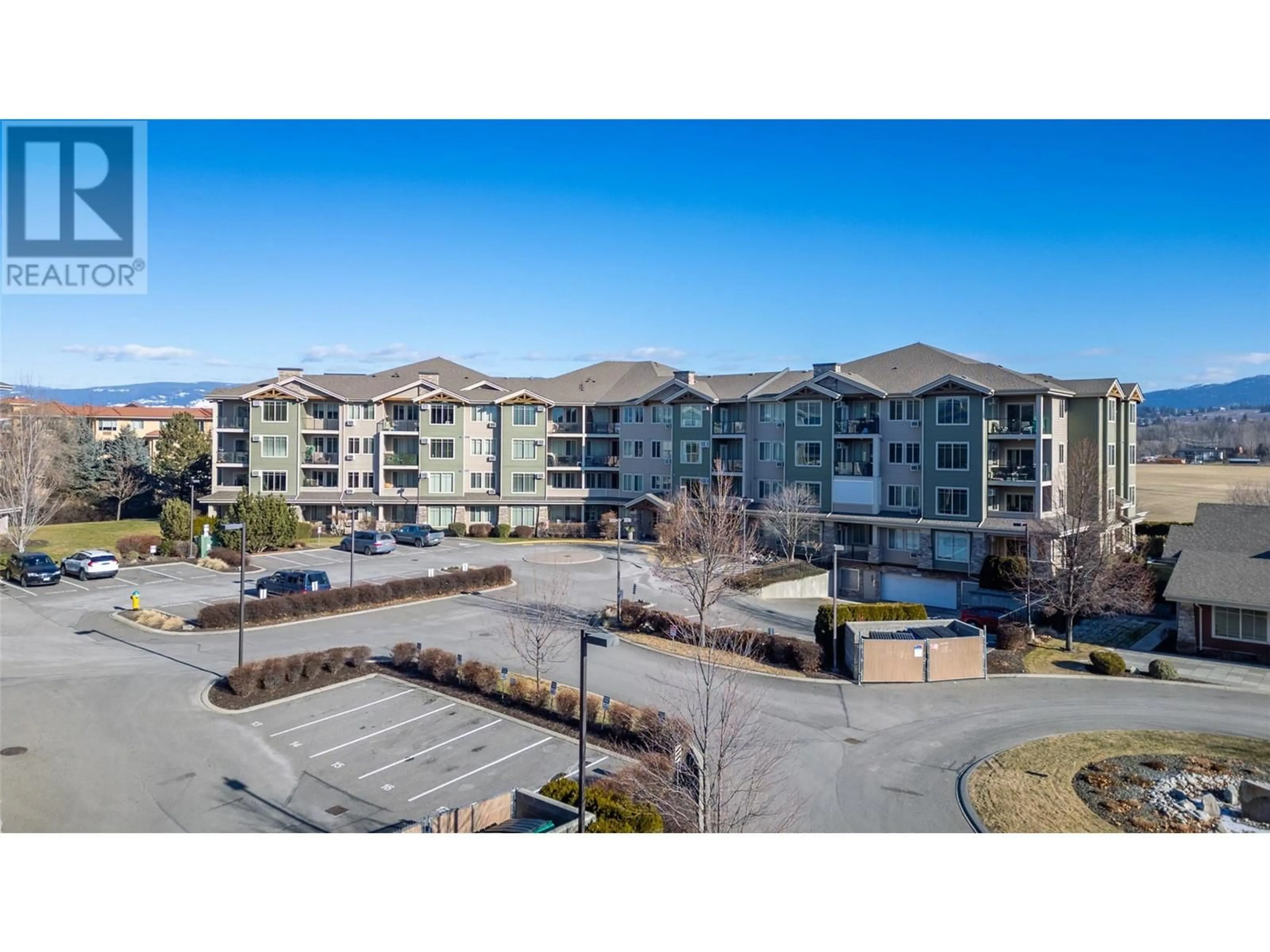 A pic from outside/outdoor area/front of a property/back of a property/a pic from drone, mountain view for 3735 Casorso Road Unit# 413, Kelowna British Columbia V1W5G1