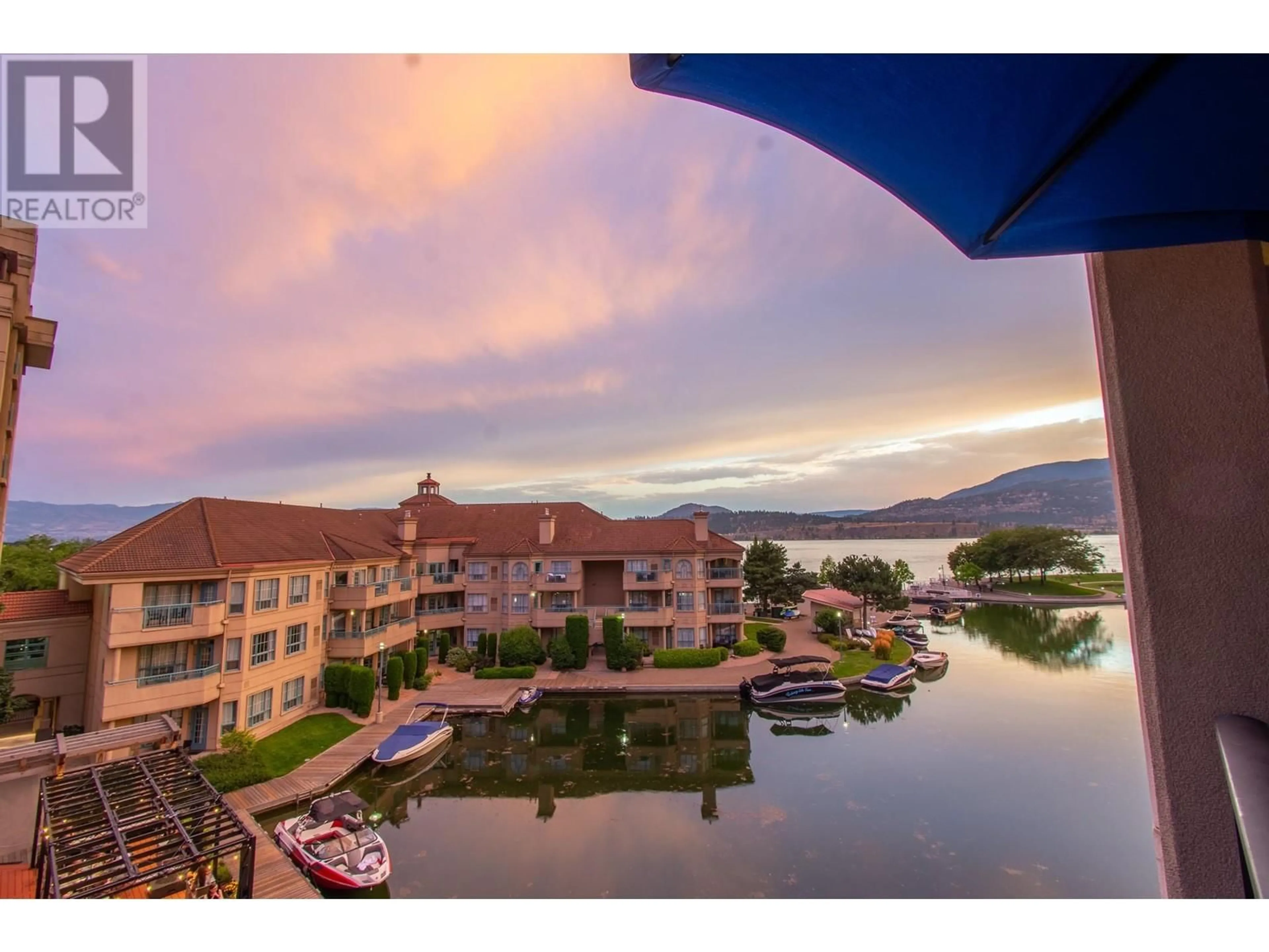 A pic from outside/outdoor area/front of a property/back of a property/a pic from drone, water/lake/river/ocean view for 450 - 1288 WATER STREET, Kelowna British Columbia V1Y9P3