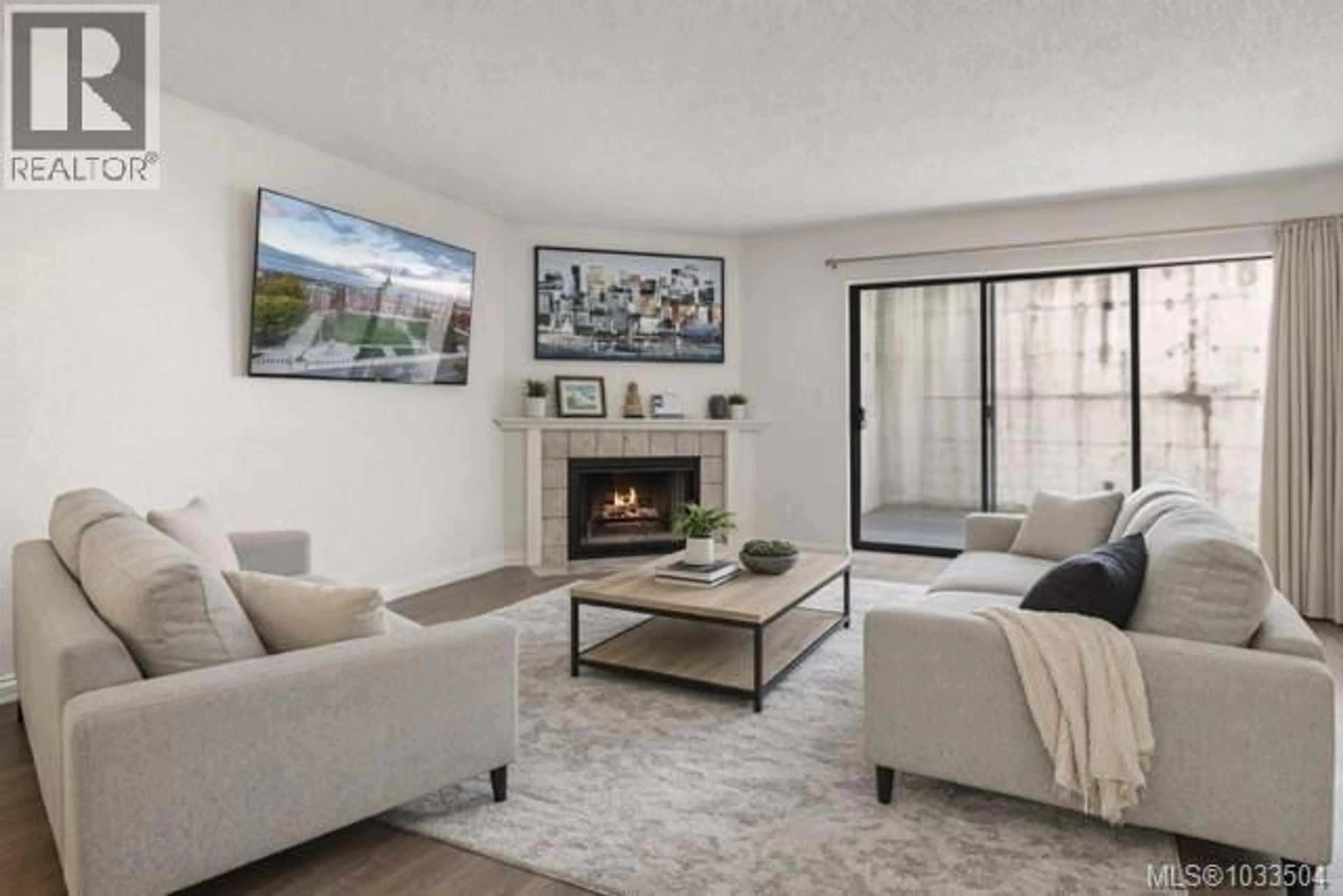 Living room with furniture, unknown for 215 - 3255 GLASGOW AVENUE, Saanich British Columbia V8X2S4