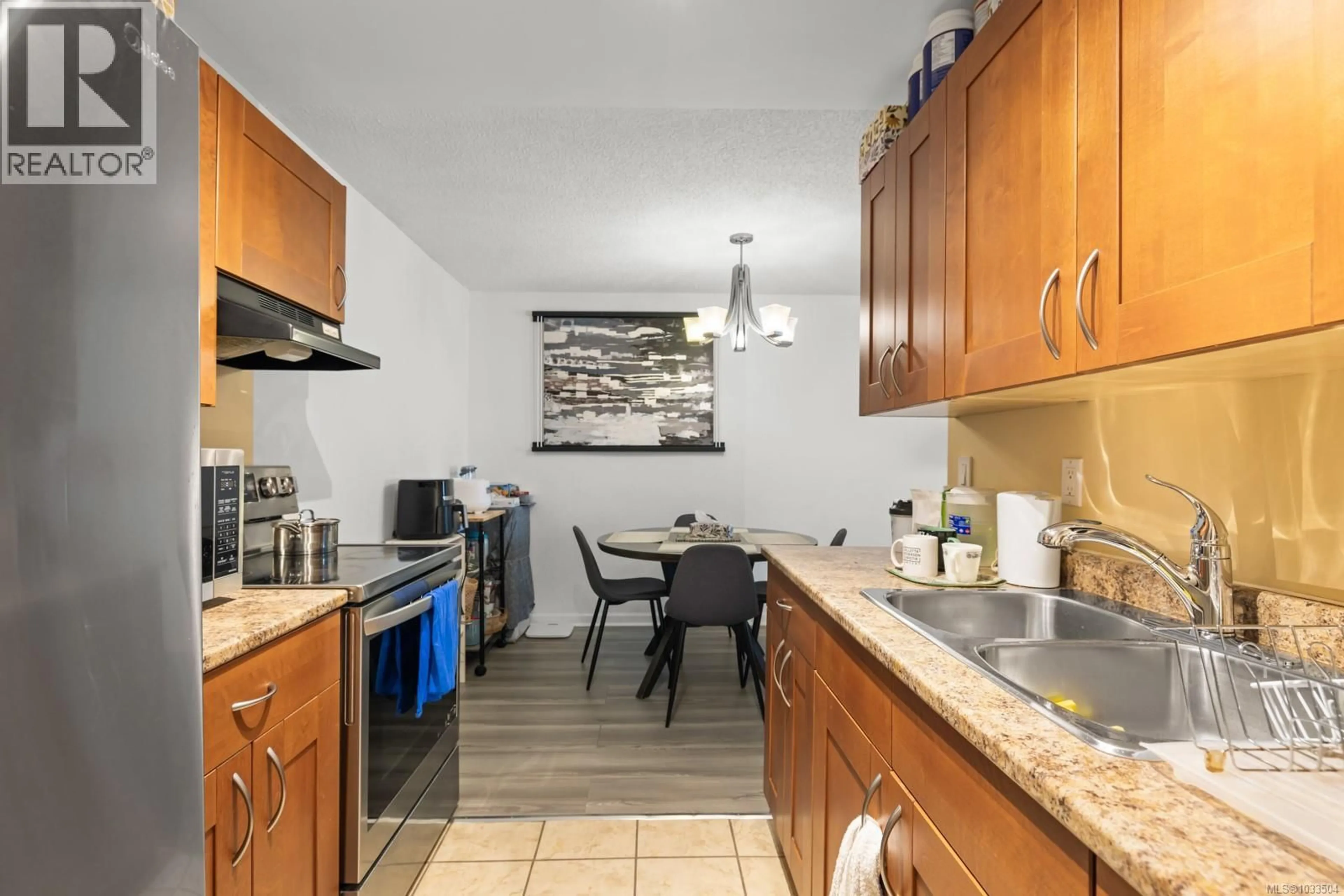 Standard kitchen, ceramic/tile floor for 215 - 3255 GLASGOW AVENUE, Saanich British Columbia V8X2S4
