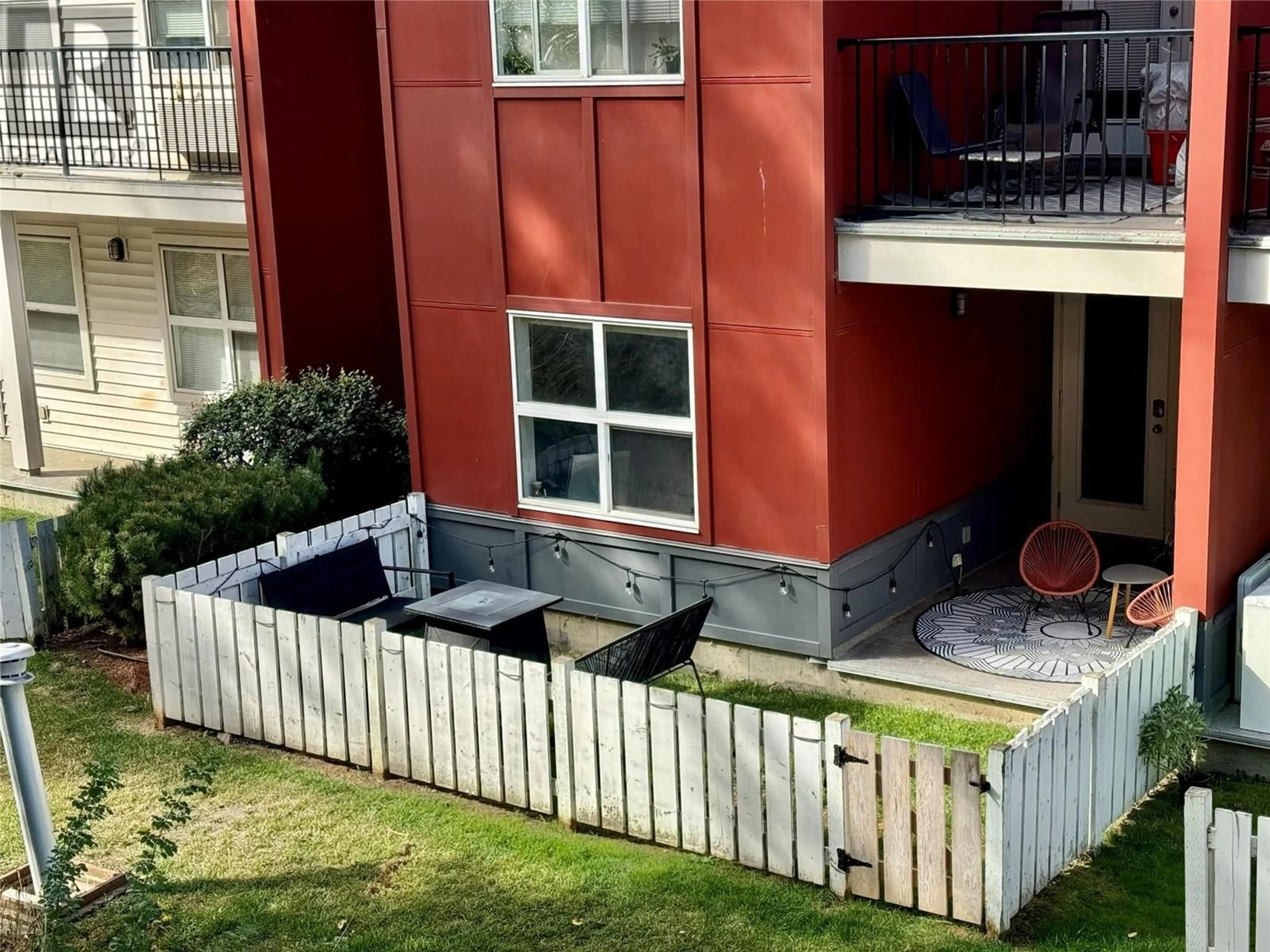 Balcony in the apartment, city buildings view from balcony for 1481 Glenmore Road N Unit# 210, Kelowna British Columbia V1V2C5