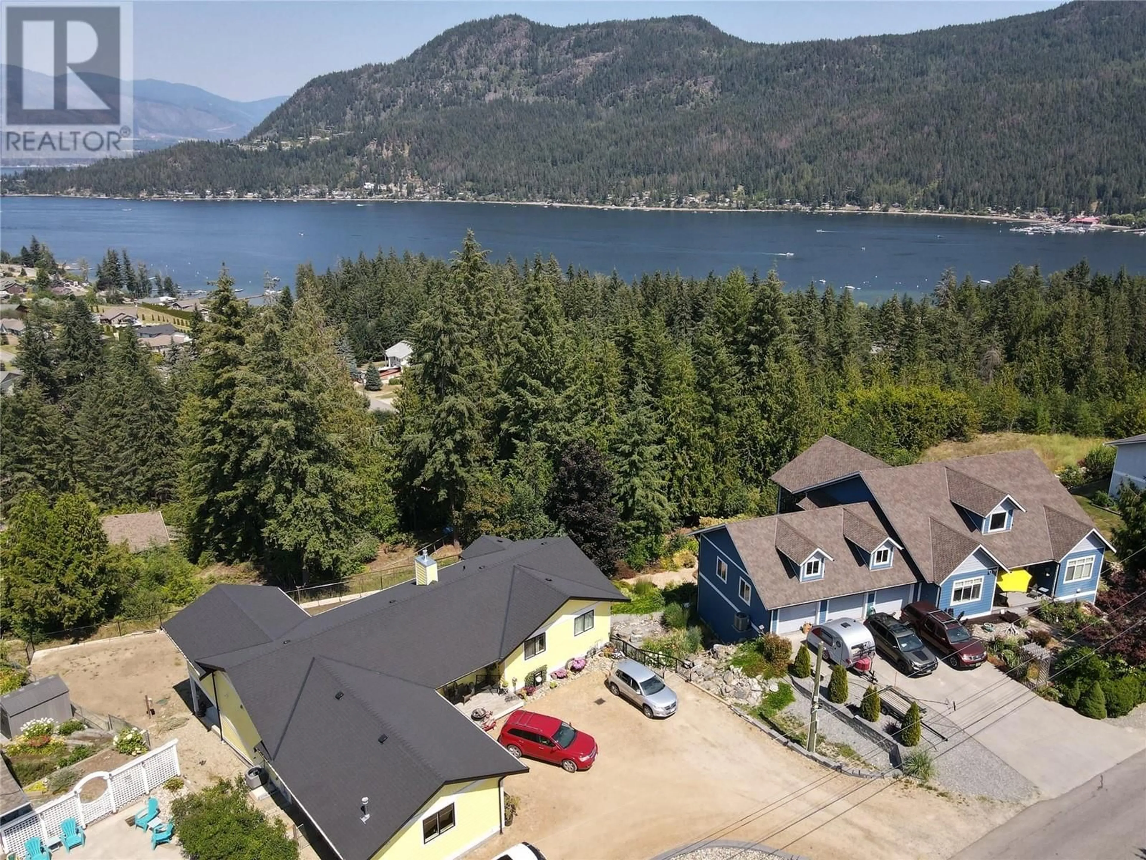 A pic from outside/outdoor area/front of a property/back of a property/a pic from drone, water/lake/river/ocean view for 2526 Waverly Drive, Blind Bay British Columbia V0E1H2