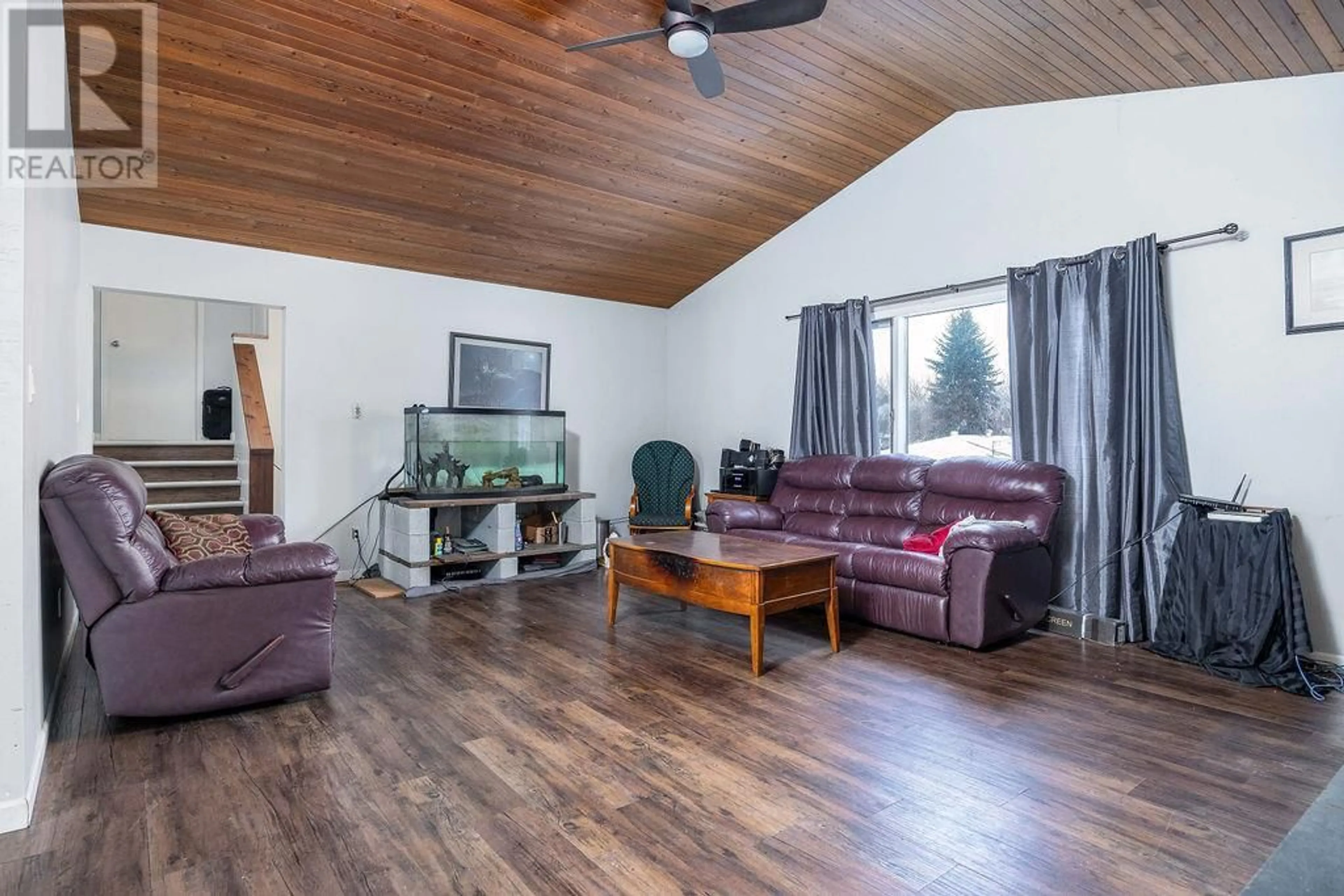 Living room with furniture, wood/laminate floor for 3605 Schubert Road, Armstrong British Columbia V0E1B2