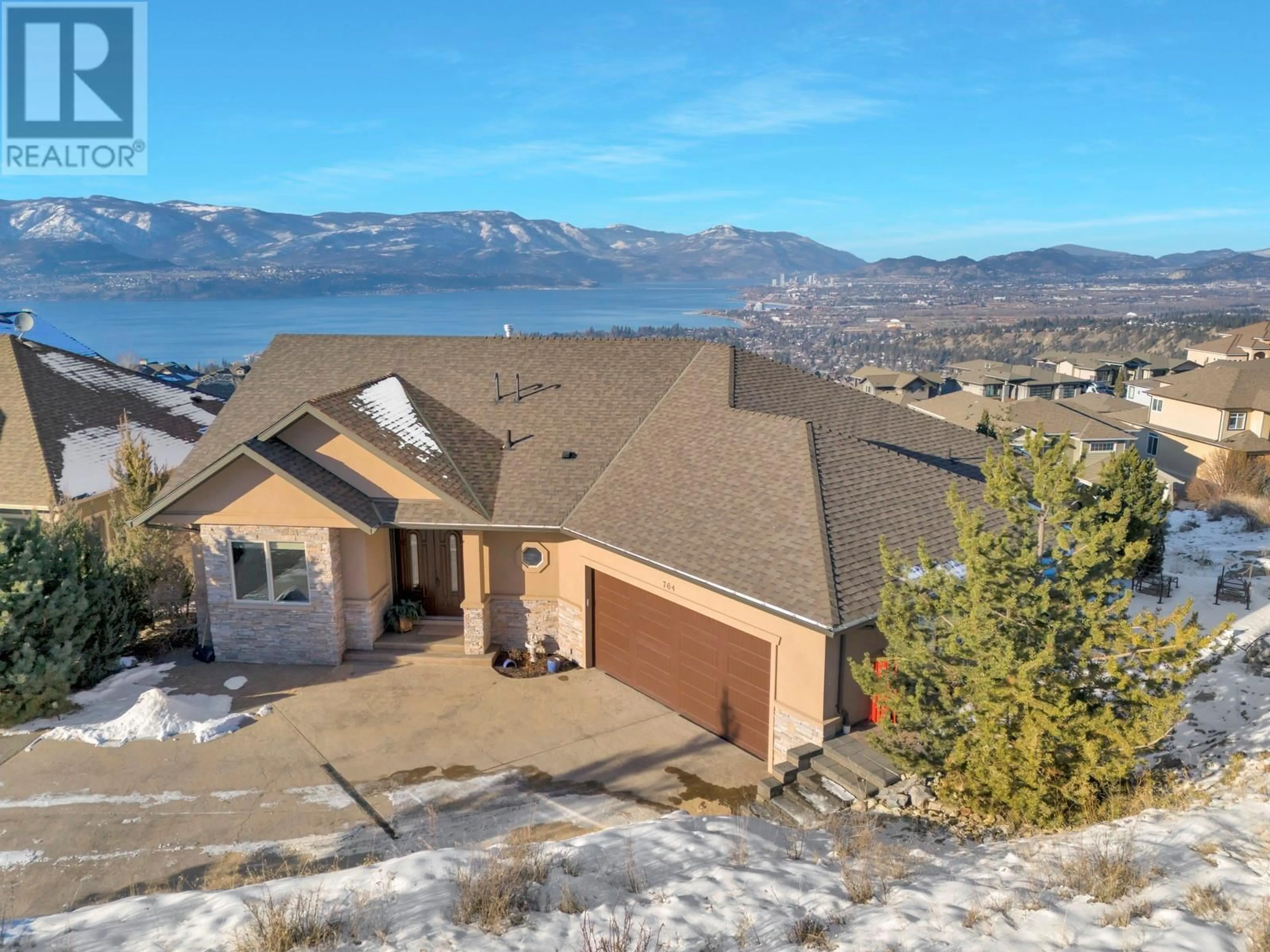 A pic from outside/outdoor area/front of a property/back of a property/a pic from drone, mountain view for 764 Kuipers Crescent, Kelowna British Columbia V1W5C9