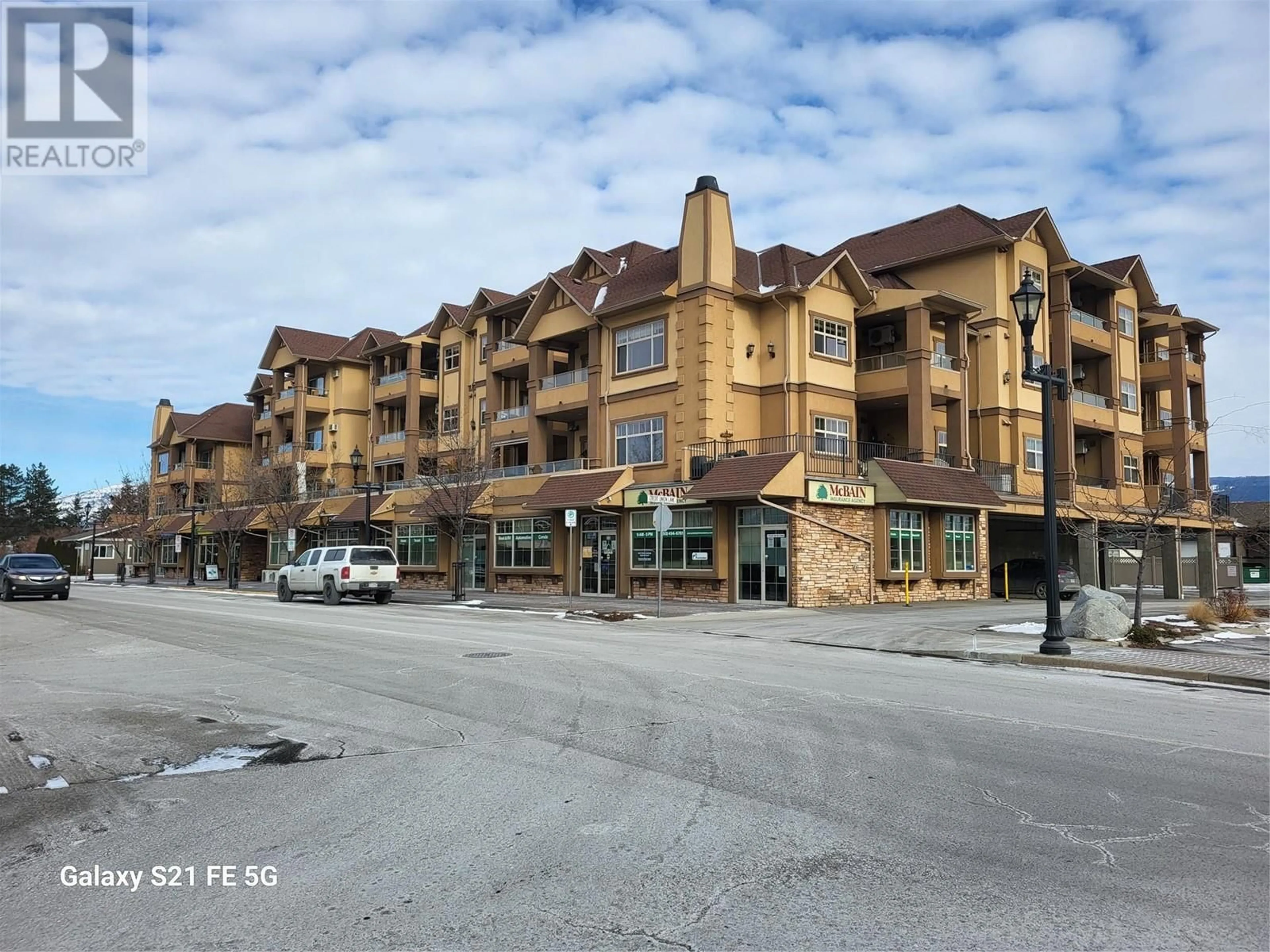 A pic from outside/outdoor area/front of a property/back of a property/a pic from drone, street for 13615 Victoria Road Unit# 204, Summerland British Columbia V0H1Z5