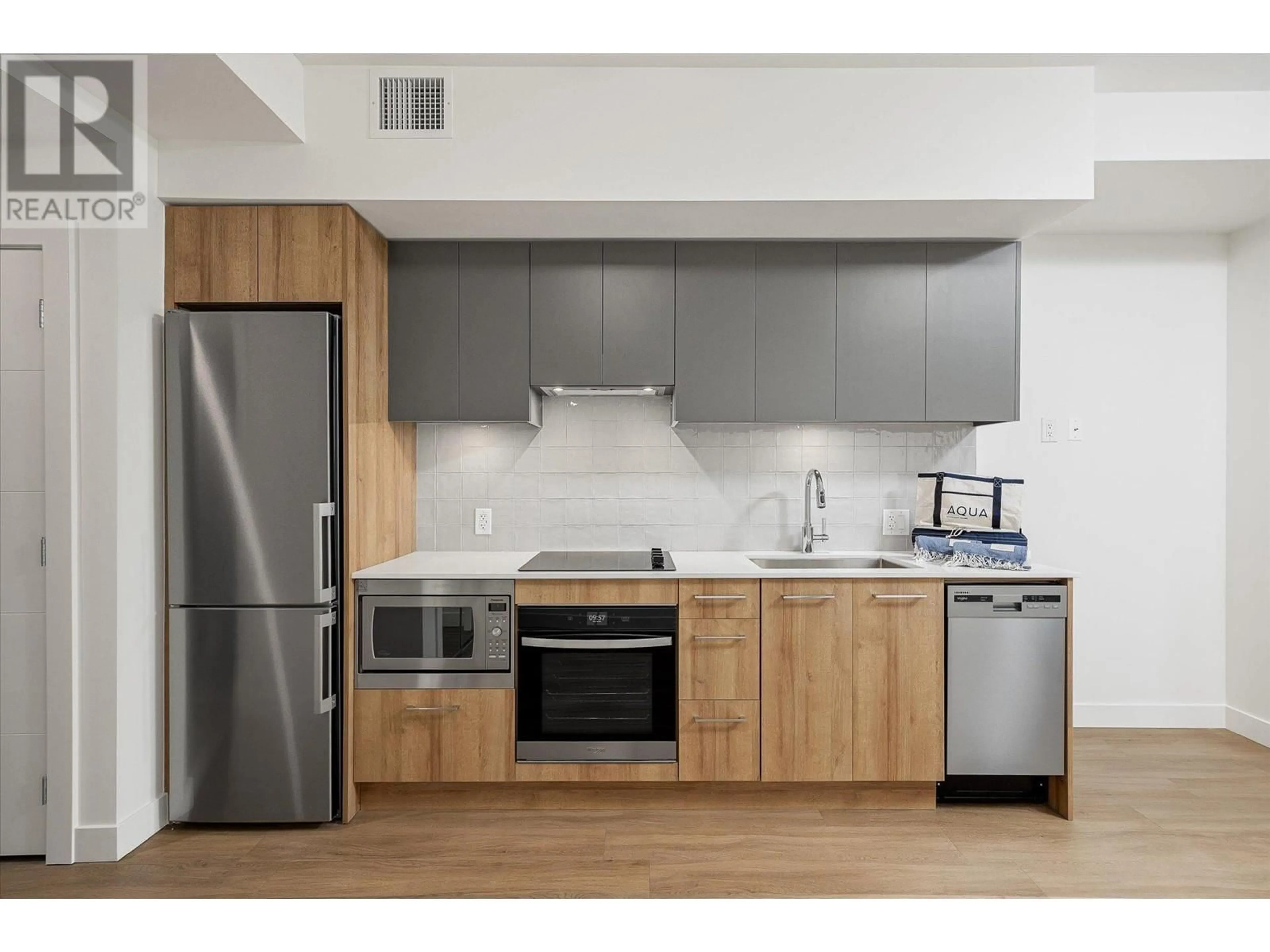 Standard kitchen, wood/laminate floor for 310 - 3699 CAPOZZI ROAD, Kelowna British Columbia V1W0G3