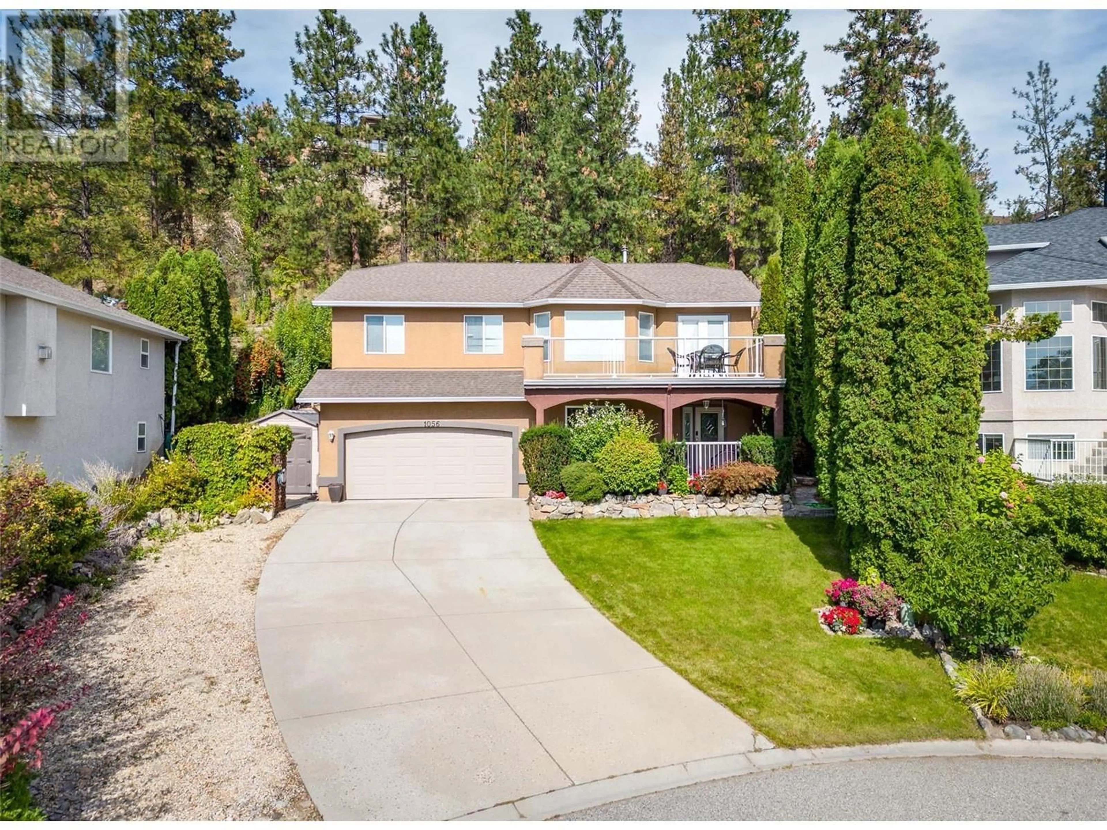 A pic from outside/outdoor area/front of a property/back of a property/a pic from drone, street for 1056 Caledonia Way, West Kelowna British Columbia V1Z3N7