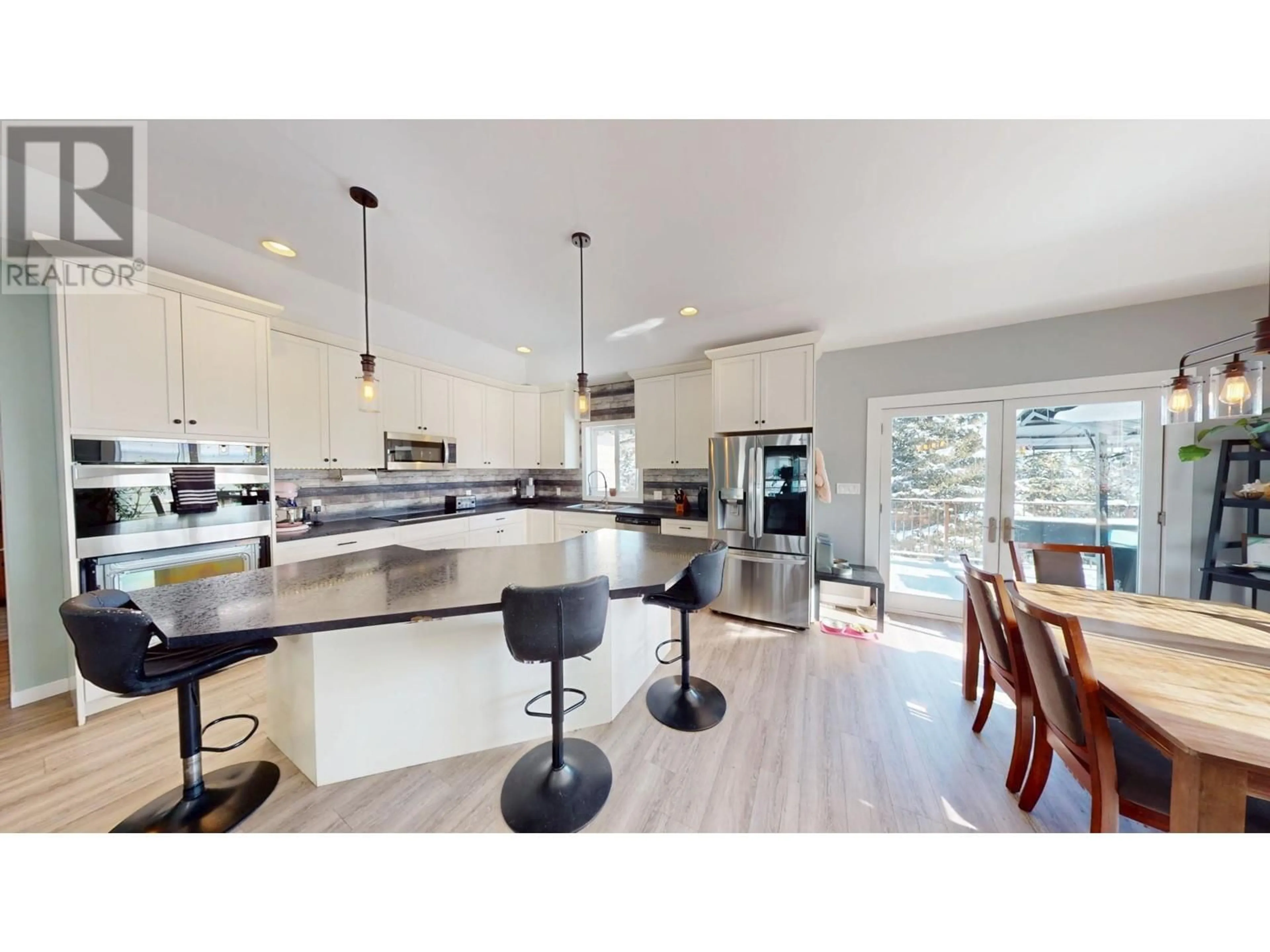 Open concept kitchen, unknown for 22 Darby Crescent, Elkford British Columbia V0B1H0