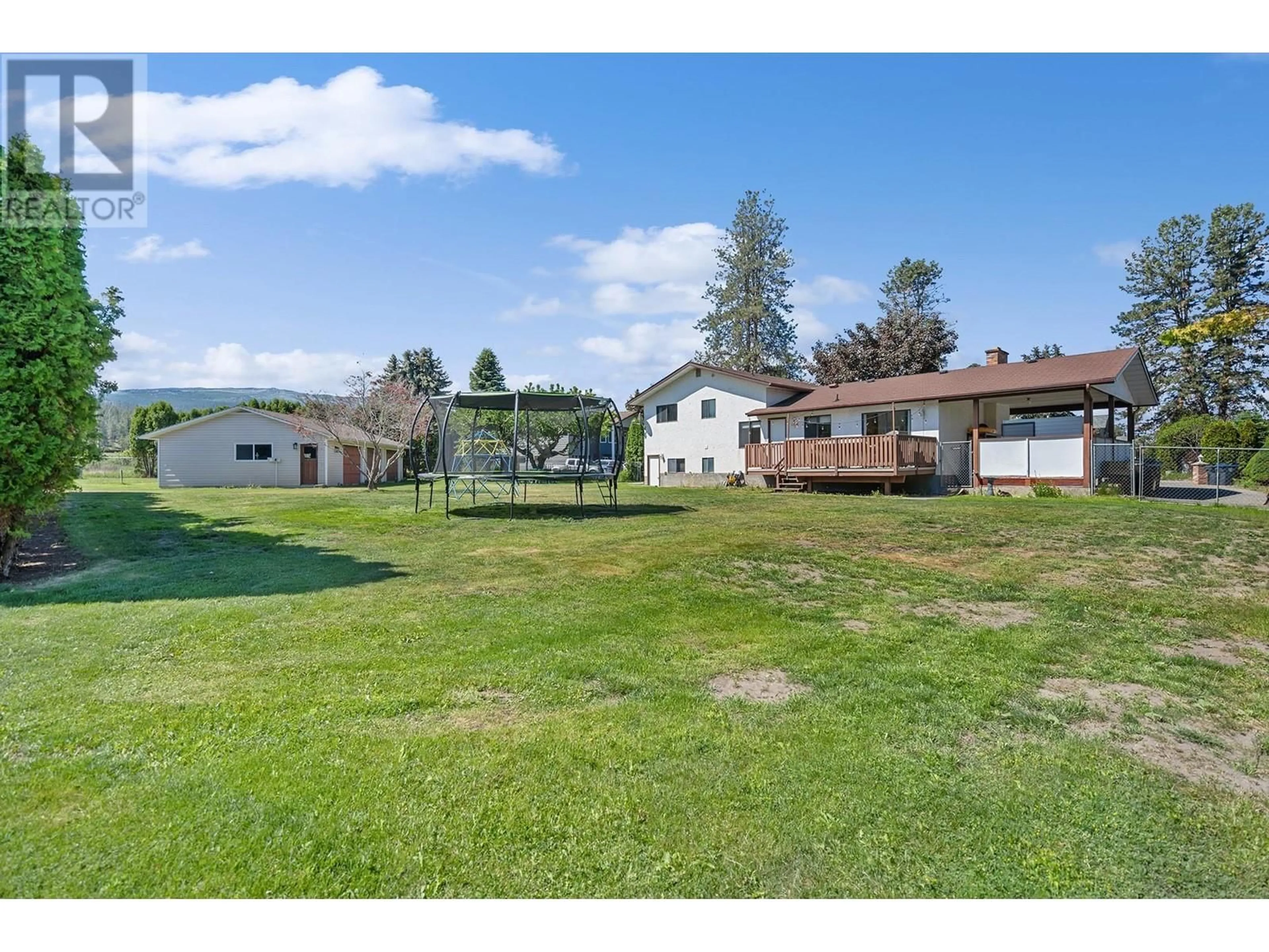 A pic from outside/outdoor area/front of a property/back of a property/a pic from drone, mountain view for 2160 Diamond Road, Kelowna British Columbia V1W4B9