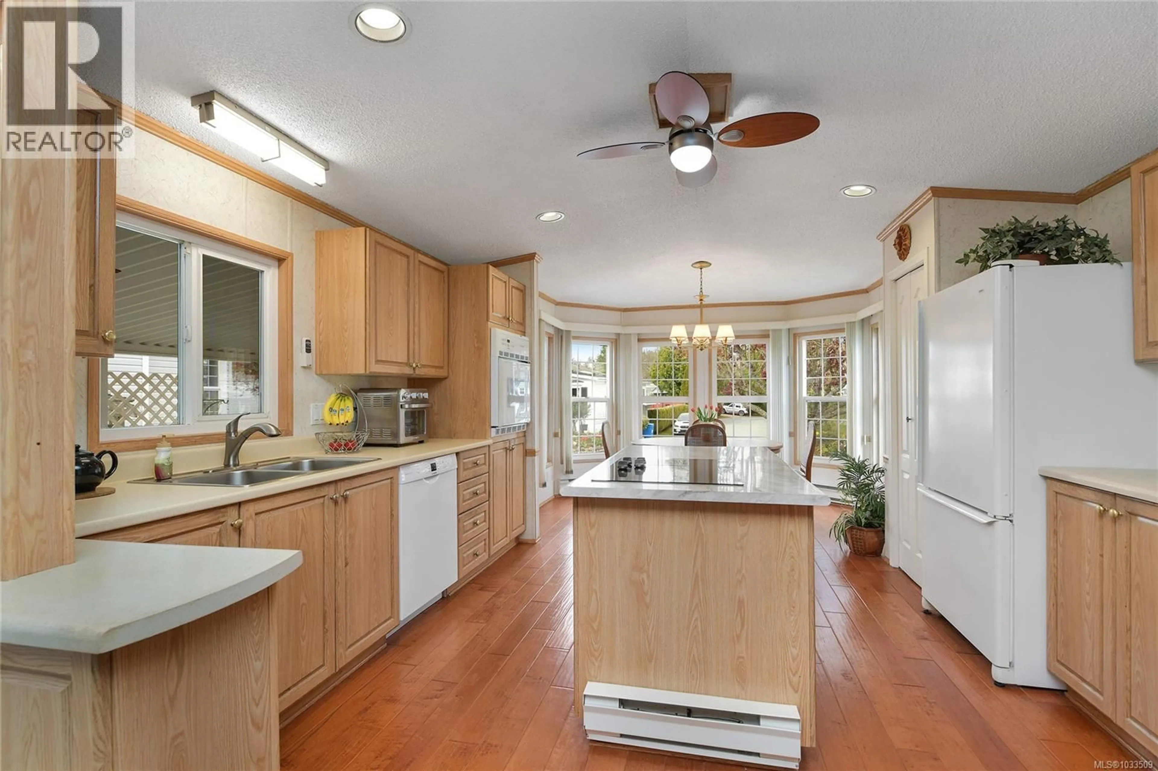 Open concept kitchen, unknown for 8 - 7401 CENTRAL SAANICH ROAD, Central Saanich British Columbia V8M2B5