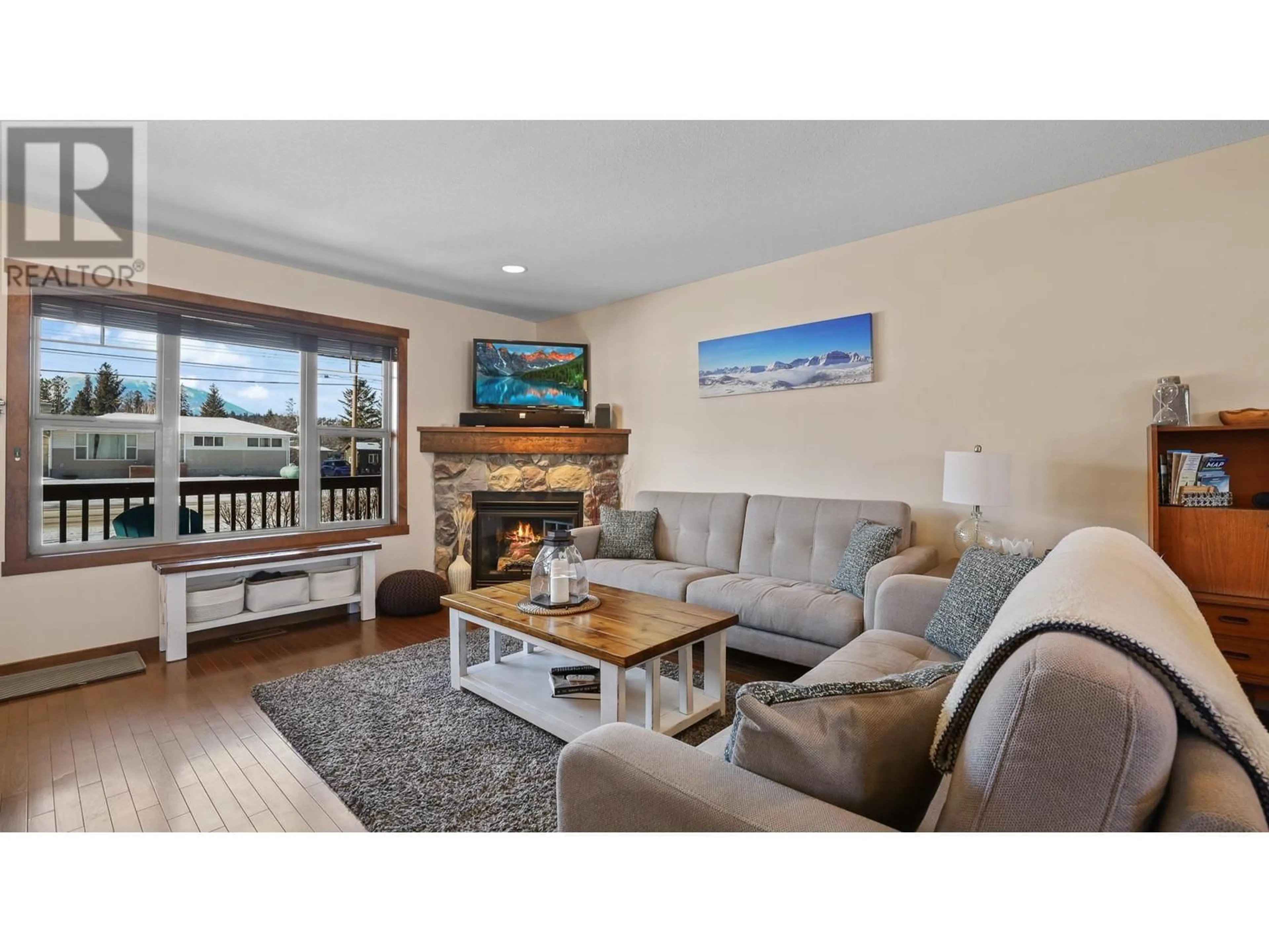 Living room with furniture, wood/laminate floor for 1000 12TH Street Unit# 24, Invermere British Columbia V0A1K4