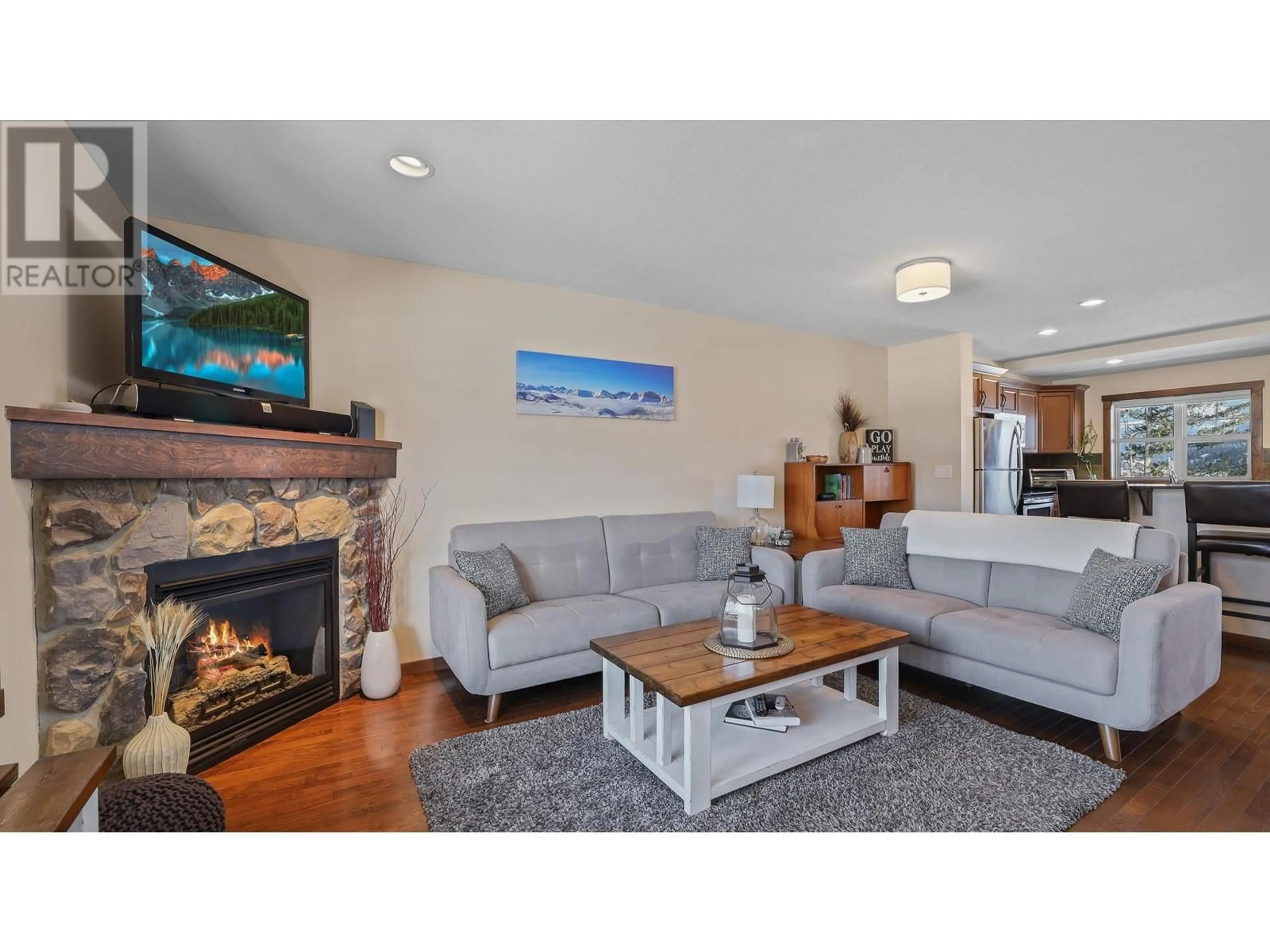 Living room with furniture, wood/laminate floor for 1000 12TH Street Unit# 24, Invermere British Columbia V0A1K4