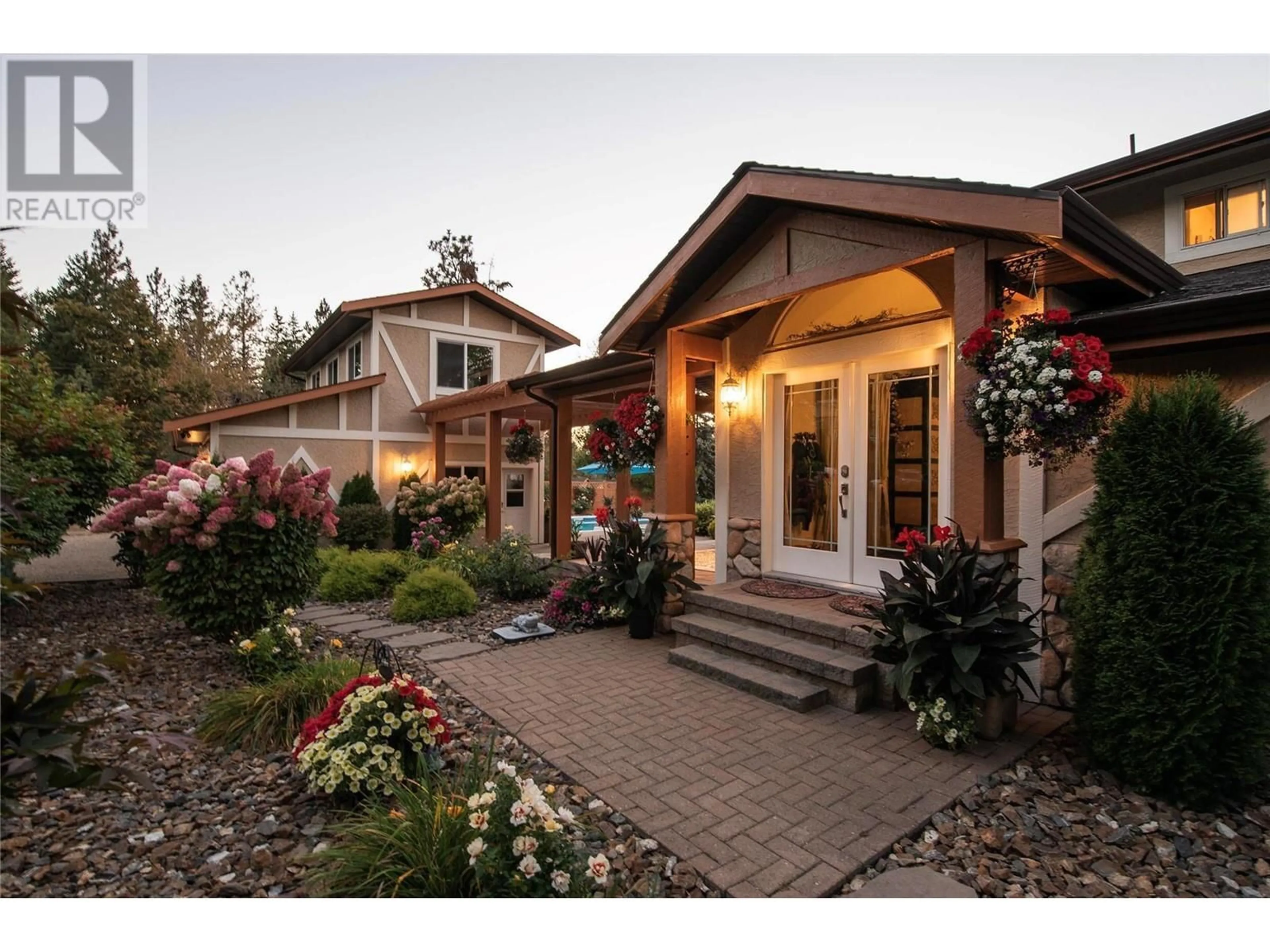 Home with brick exterior material, unknown for 3668 Luxmoore Road, Kelowna British Columbia V1W4C7