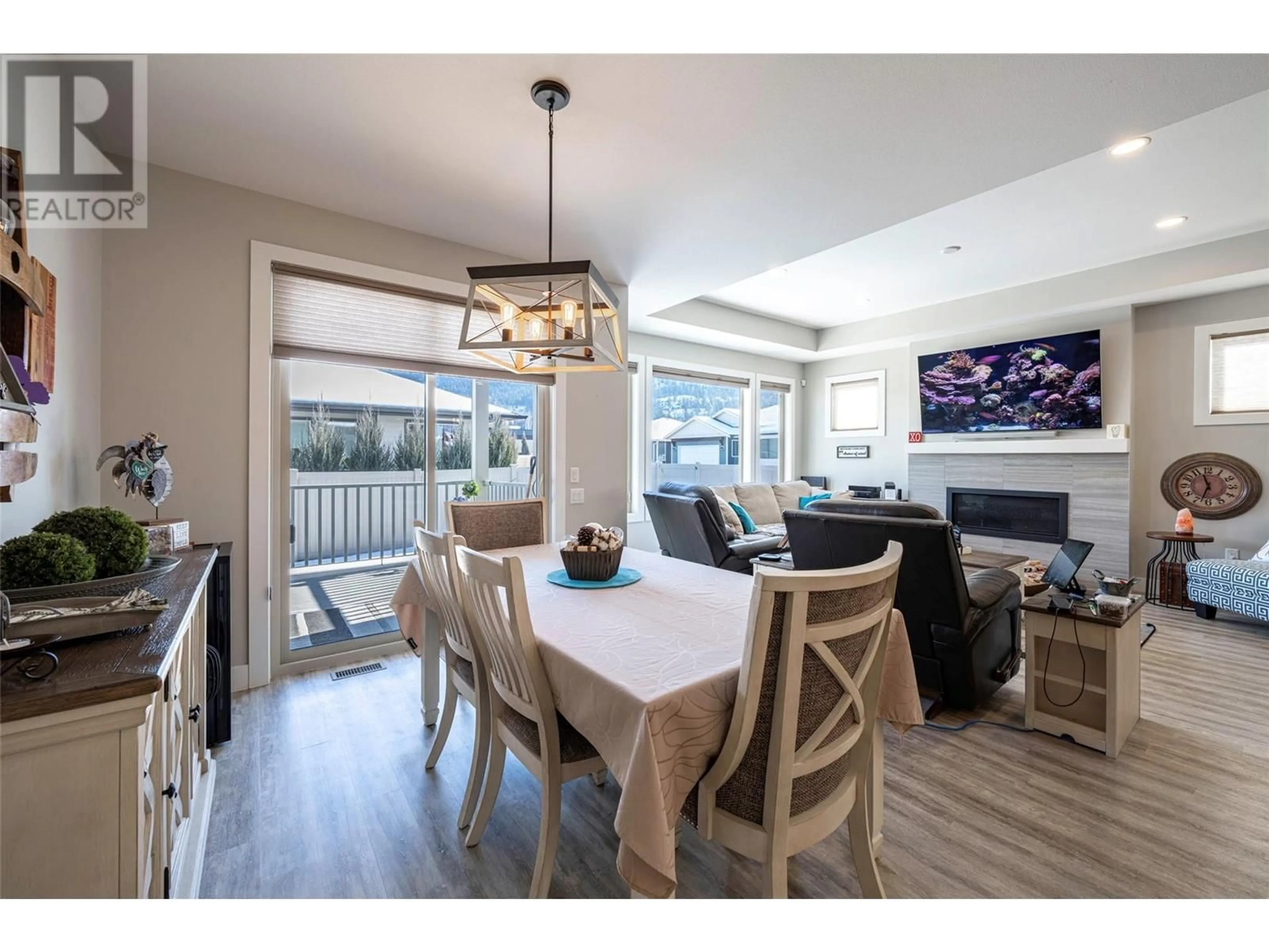 Open concept kitchen, wood/laminate floor for 2257 Rahn Street, Armstrong British Columbia V0E1B8