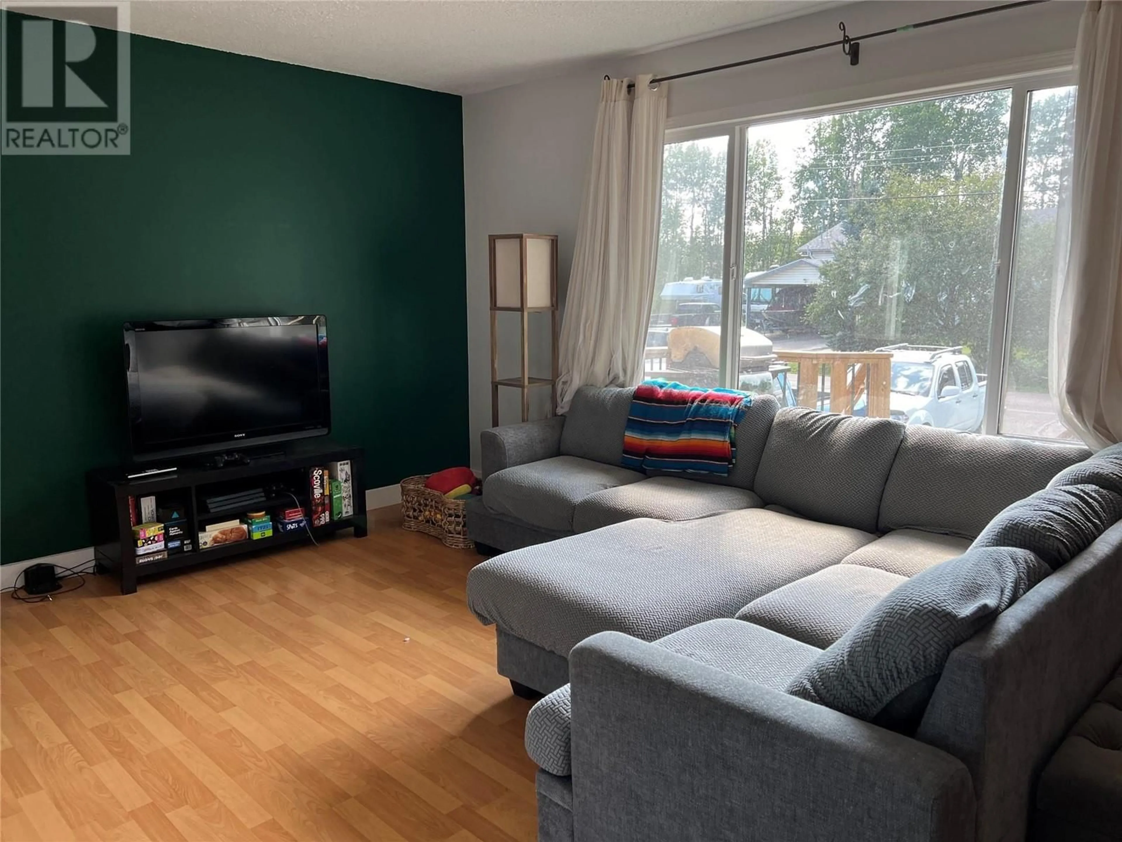 Living room with furniture, unknown for 5216 42 STREET NORTHEAST, Chetwynd British Columbia V0C1J0